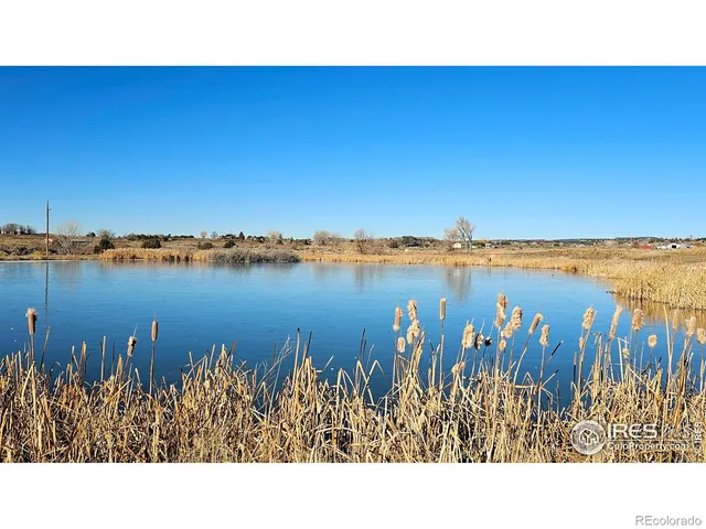 a view of swimming pool from a balcony