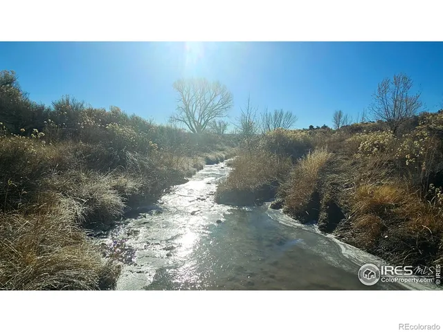 a view of a garage with parked cars