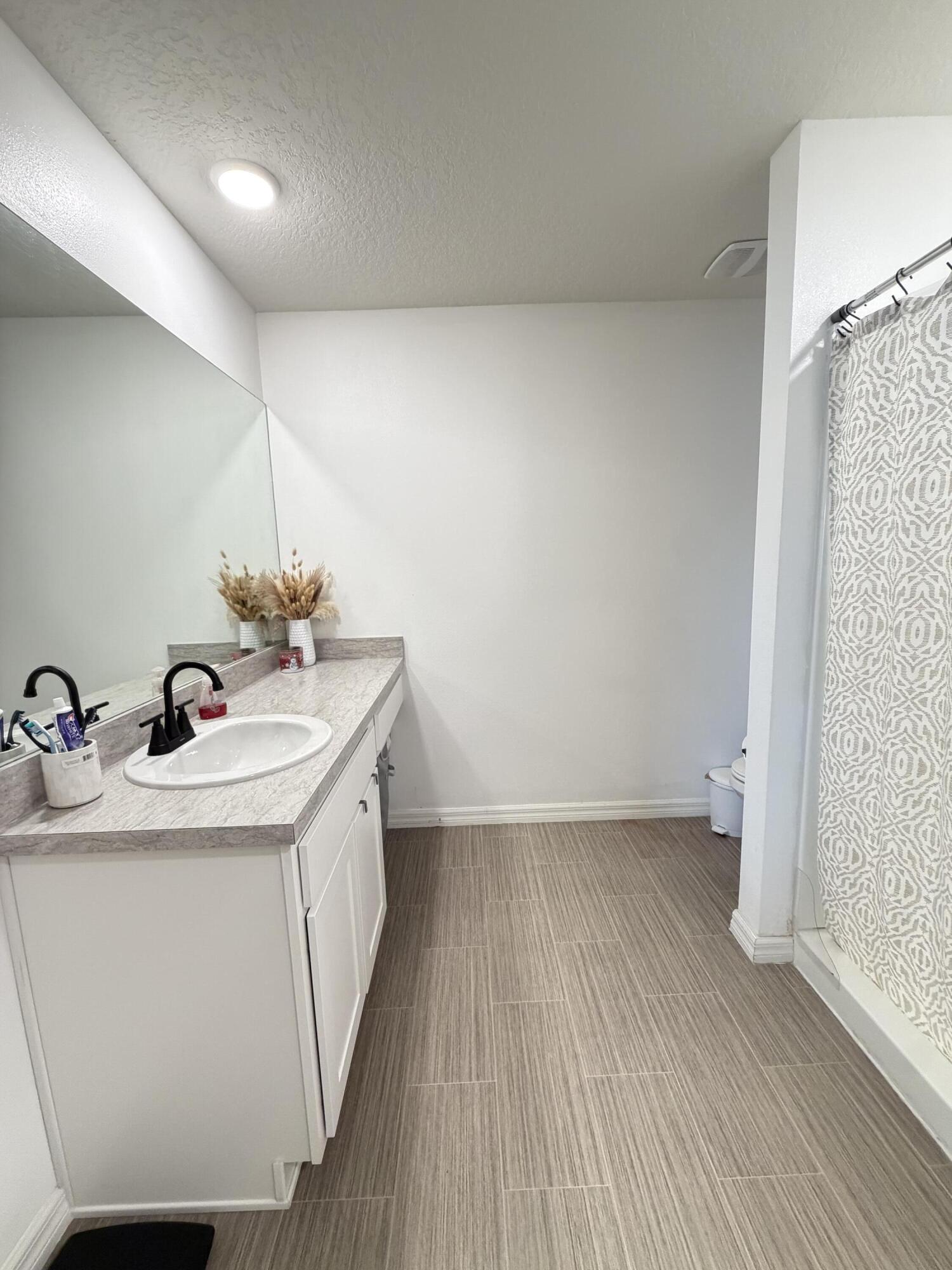 4249 Southwest Whitebread Road Port St. Lucie, FL 34953 - Photo 21 of 43 a utility room with sink dryer and washer