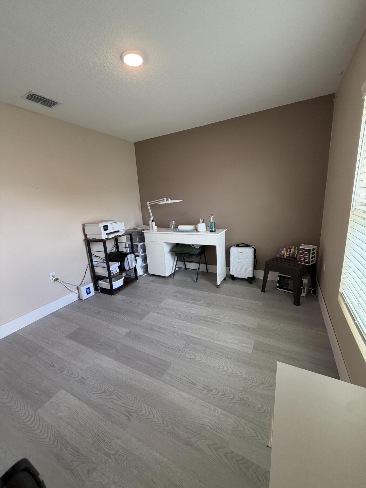 4249 Southwest Whitebread Road Port St. Lucie, FL 34953 - Photo 31 of 43 a living room with furniture