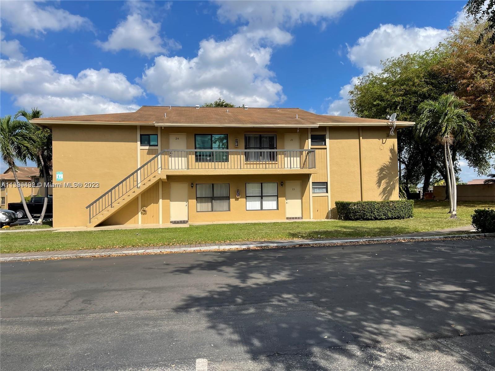 Hialeah Hialeah, FL 33016 - Photo 2 of 14 a front view of a house with a yard and garage