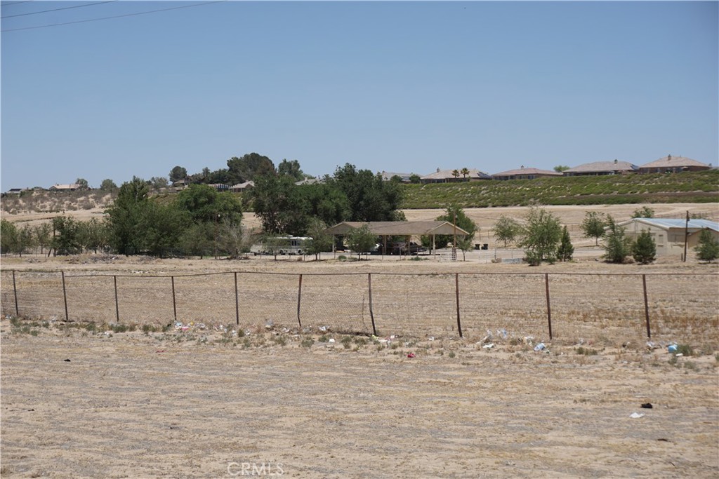 19968 Bear Valley Road Apple Valley, CA 92308 - Photo 7 of 20 a view of a yard