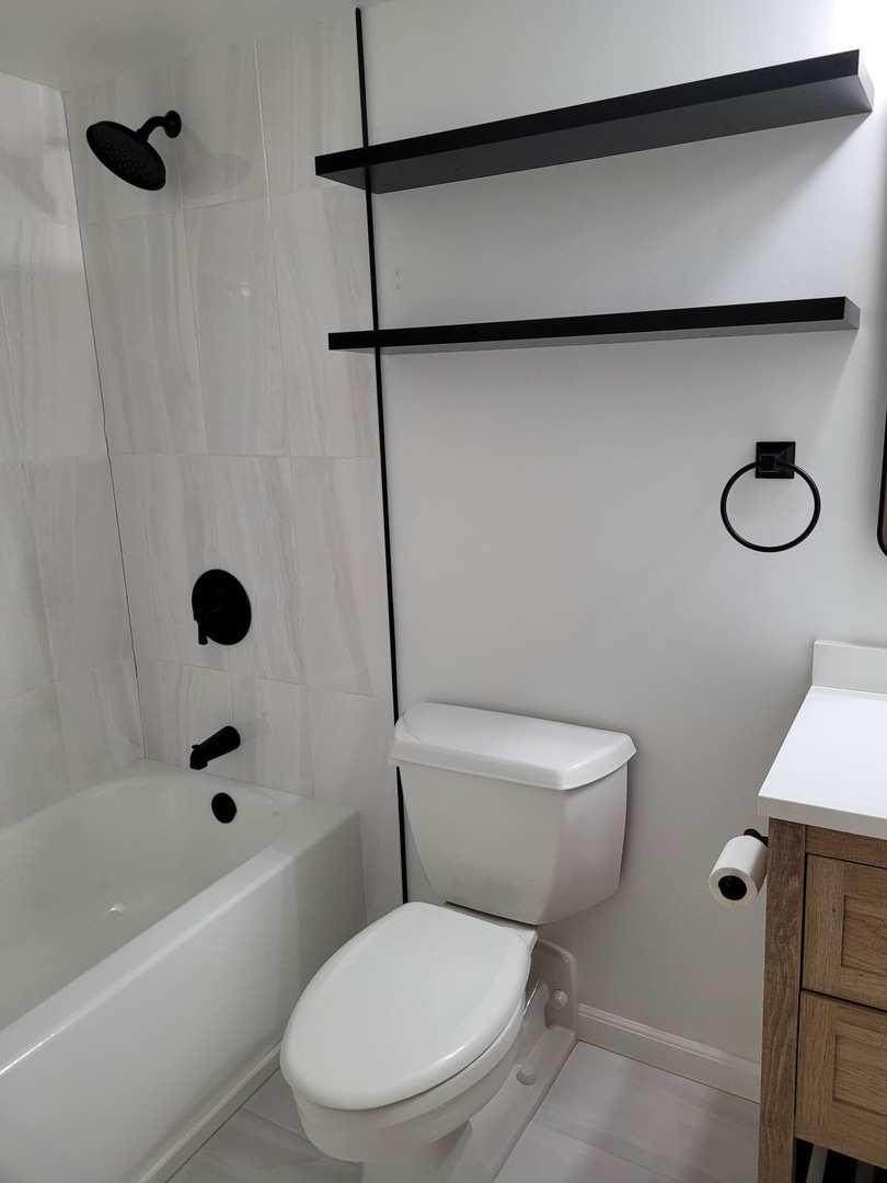 500 South Clinton Street, Unit 720 Chicago, IL 60607 - Photo 12 of 19 a white toilet sitting next to a bath tub