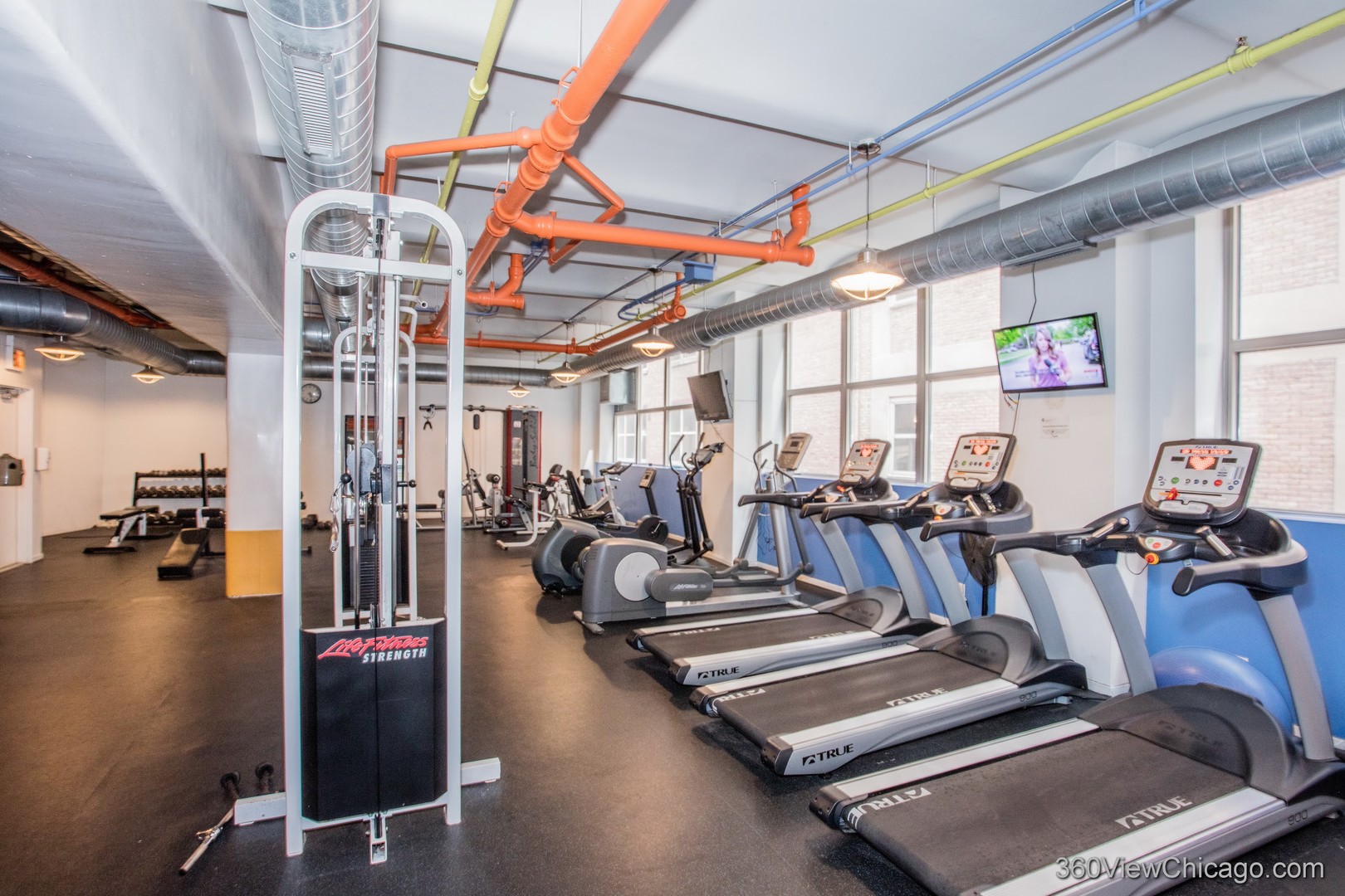 500 South Clinton Street, Unit 720 Chicago, IL 60607 - Photo 16 of 19 a view of a room with gym equipment