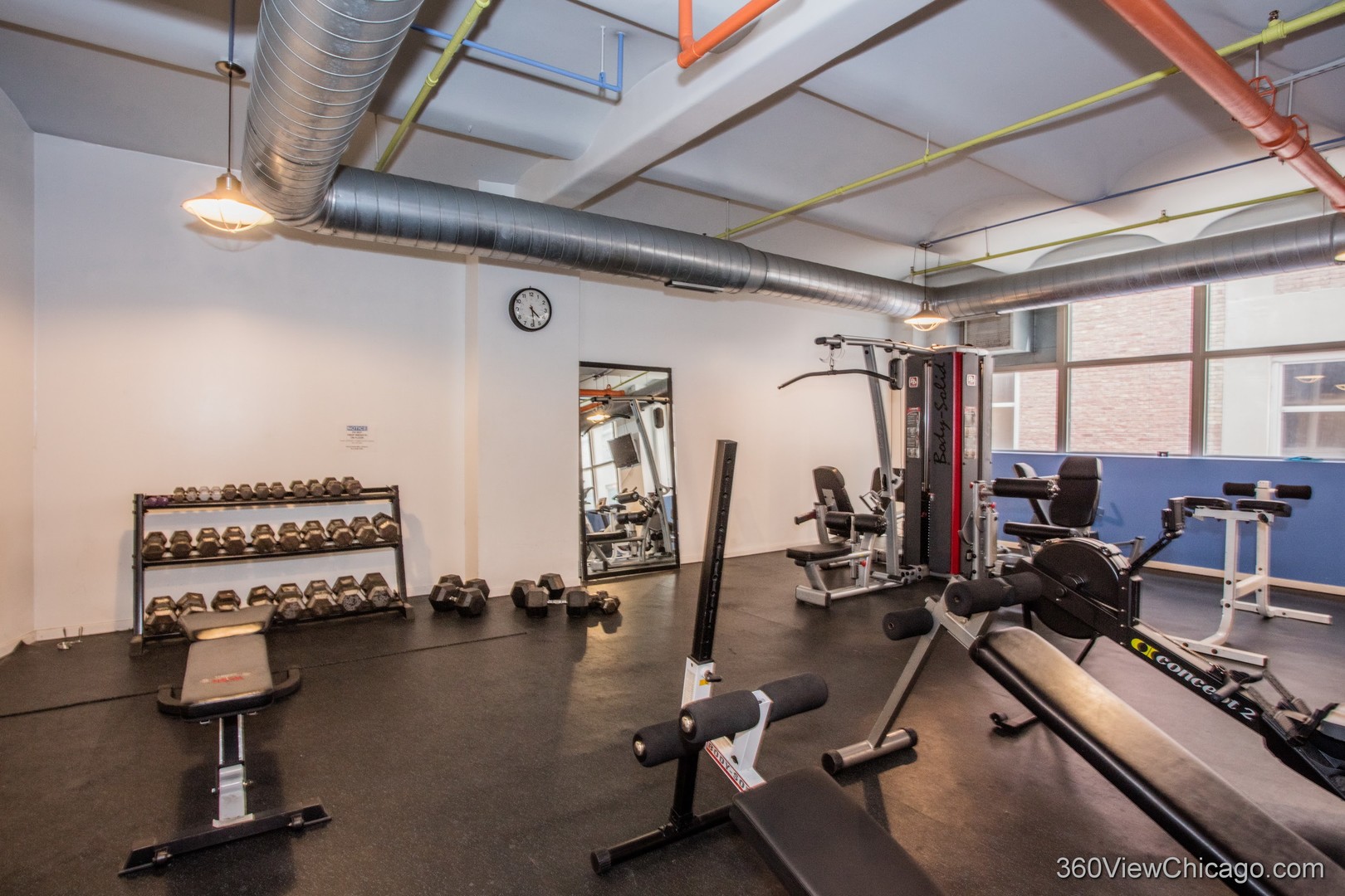 500 South Clinton Street, Unit 720 Chicago, IL 60607 - Photo 18 of 19 a view of a room with gym equipment