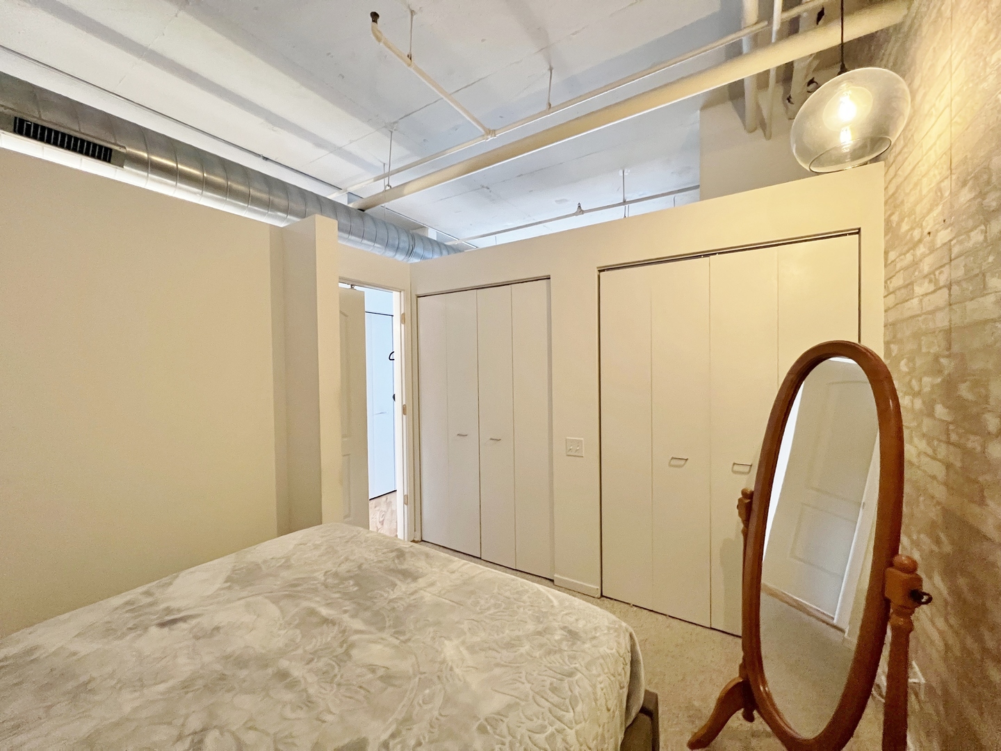 500 South Clinton Street, Unit 720 Chicago, IL 60607 - Photo 7 of 19 a bathroom with a sink and a mirror