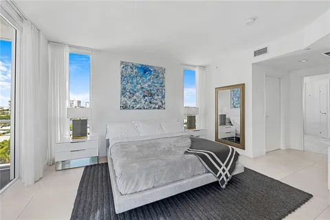 a bathroom with a bathtub and a sink