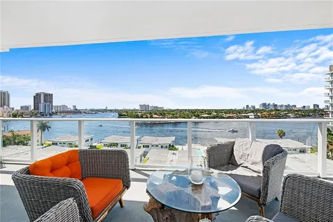 a view of balcony with furniture