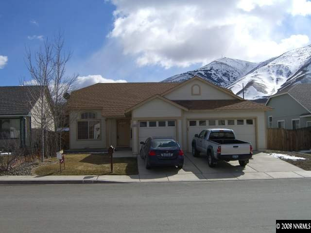 8020 Monterey Reno, NV 89506 - Photo 1 of 5 a car parked in front of a house