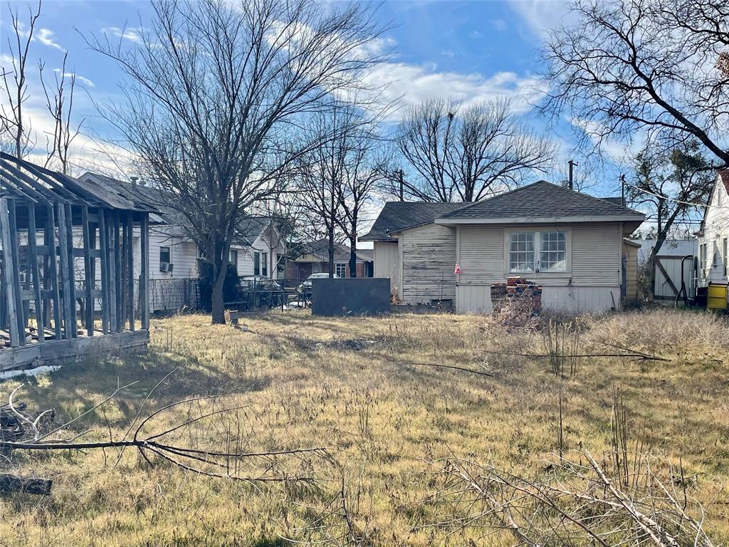 502 North Kramer Street Dallas, TX 75211 - Photo 19 of 19 a view of a house with a yard