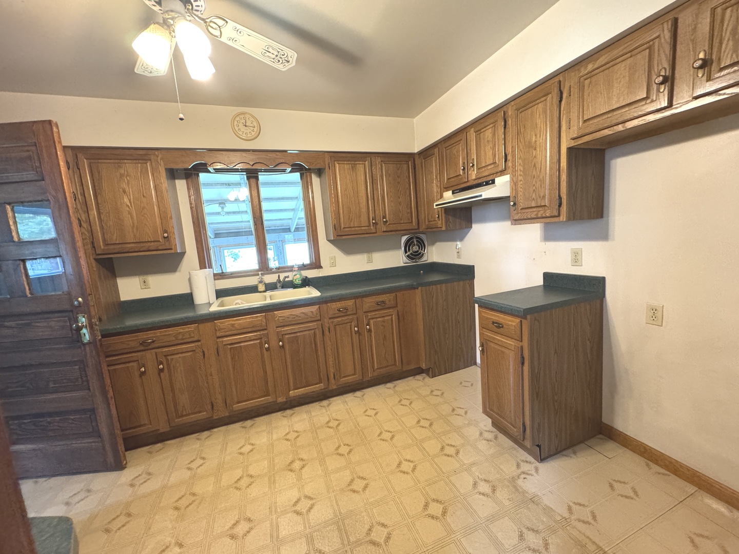 428 West Cherry Street Compton, IL 61318 - Photo 11 of 20 a kitchen with stainless steel appliances granite countertop a sink and cabinets