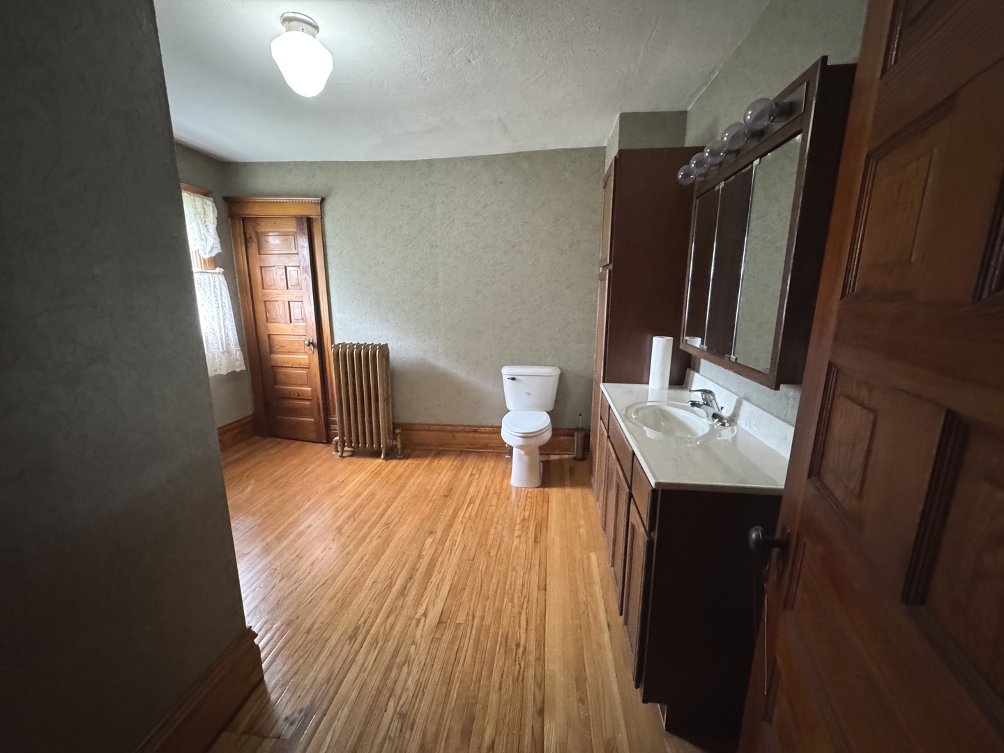 428 West Cherry Street Compton, IL 61318 - Photo 19 of 20 a view of a living room with furniture and wooden floor