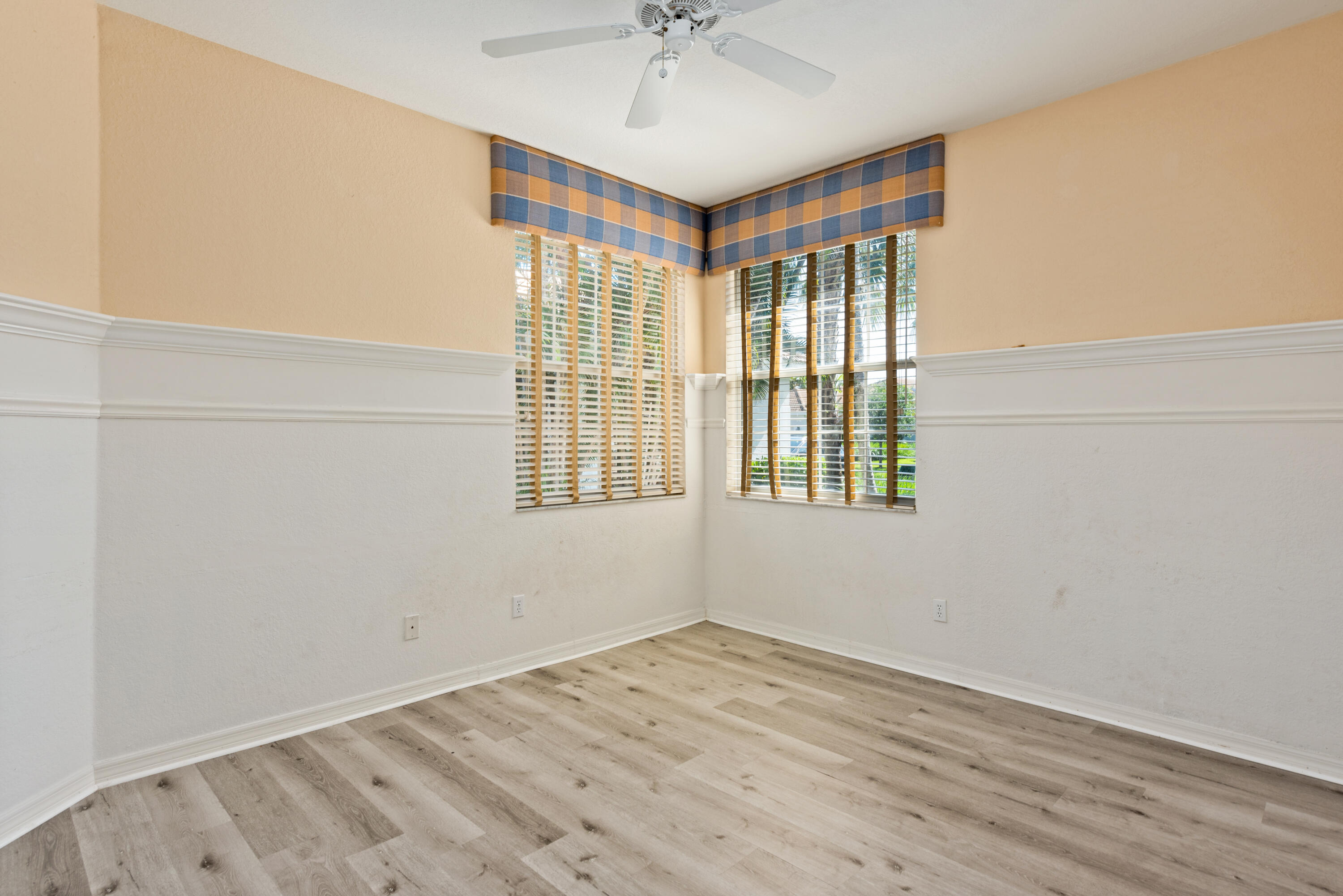 8525 Peppertree Way Naples, FL 34114 - Photo 16 of 47 a view of an empty room with a window