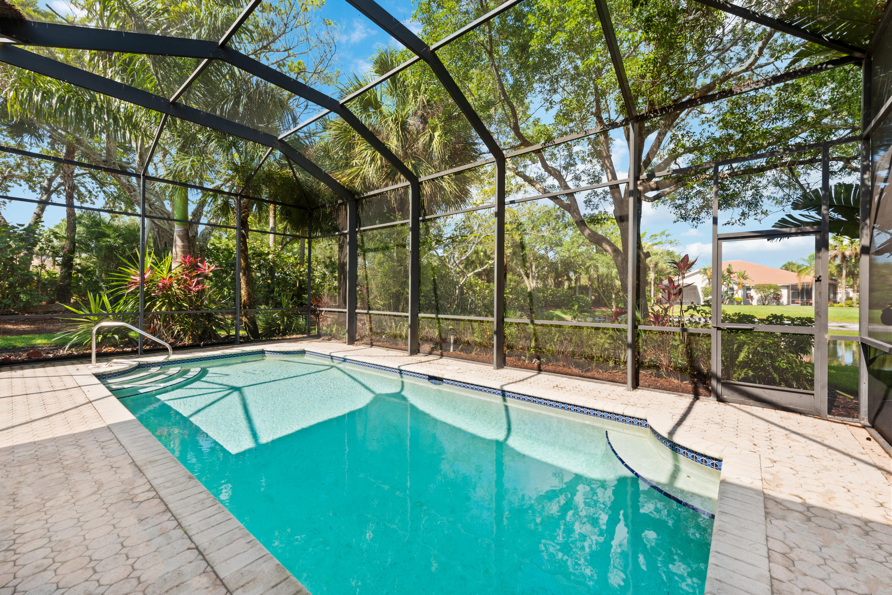 8525 Peppertree Way Naples, FL 34114 - Photo 22 of 47 a view of a house with swimming pool