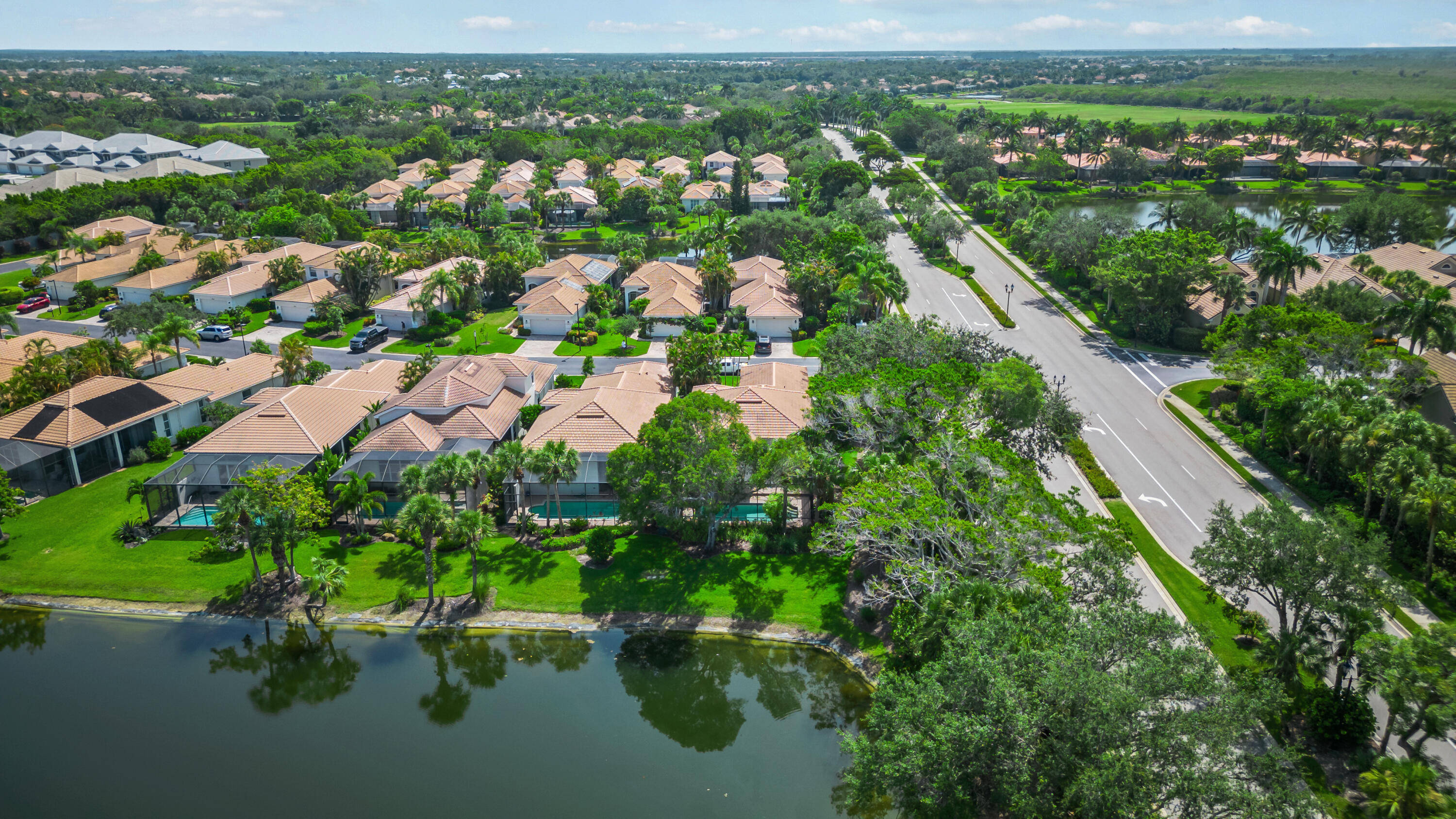 8525 Peppertree Way Naples, FL 34114 - Photo 28 of 47 an aerial view of residential houses with outdoor space and trees