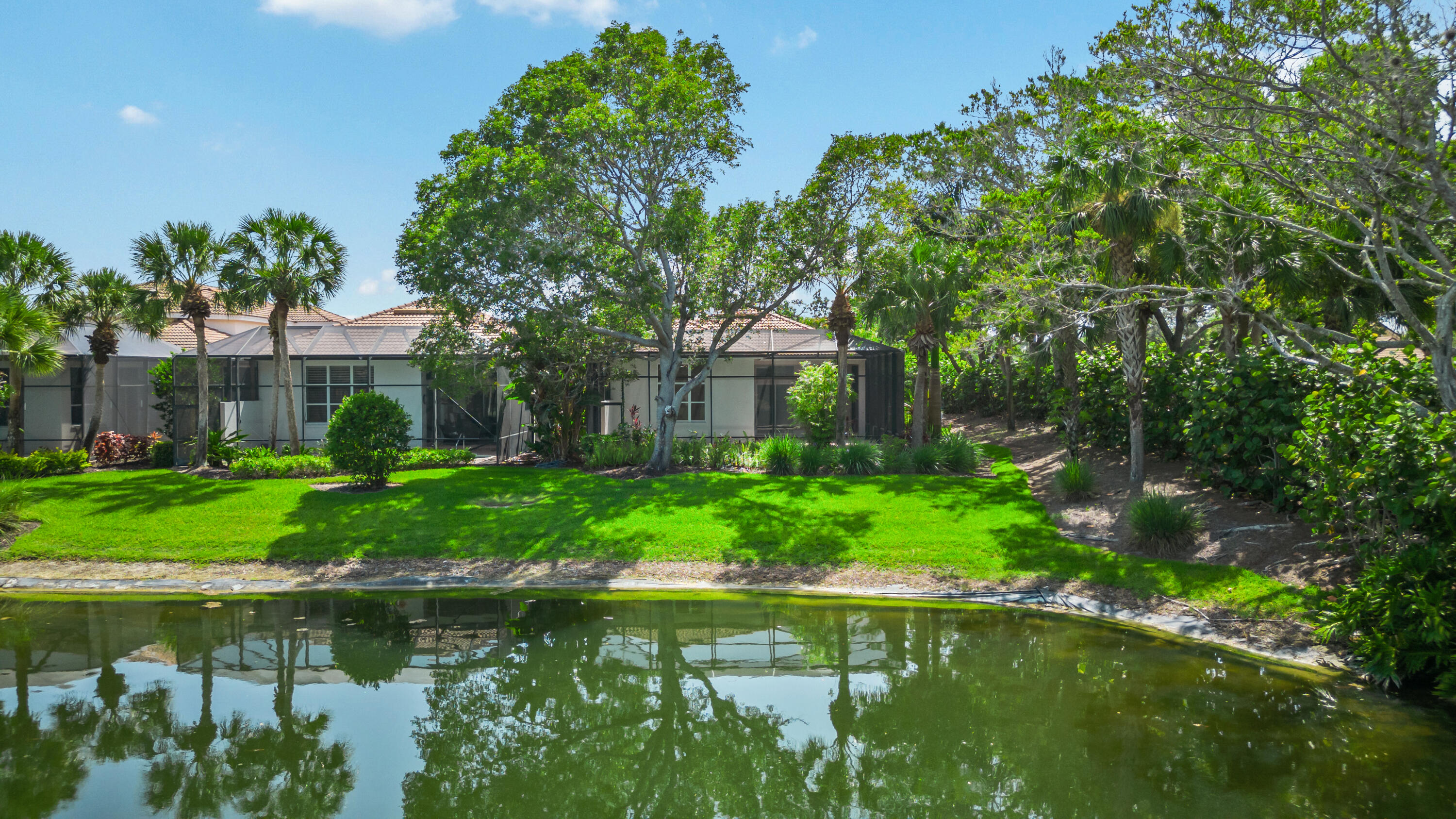 8525 Peppertree Way Naples, FL 34114 - Photo 30 of 47 a view of a garden with a fountain