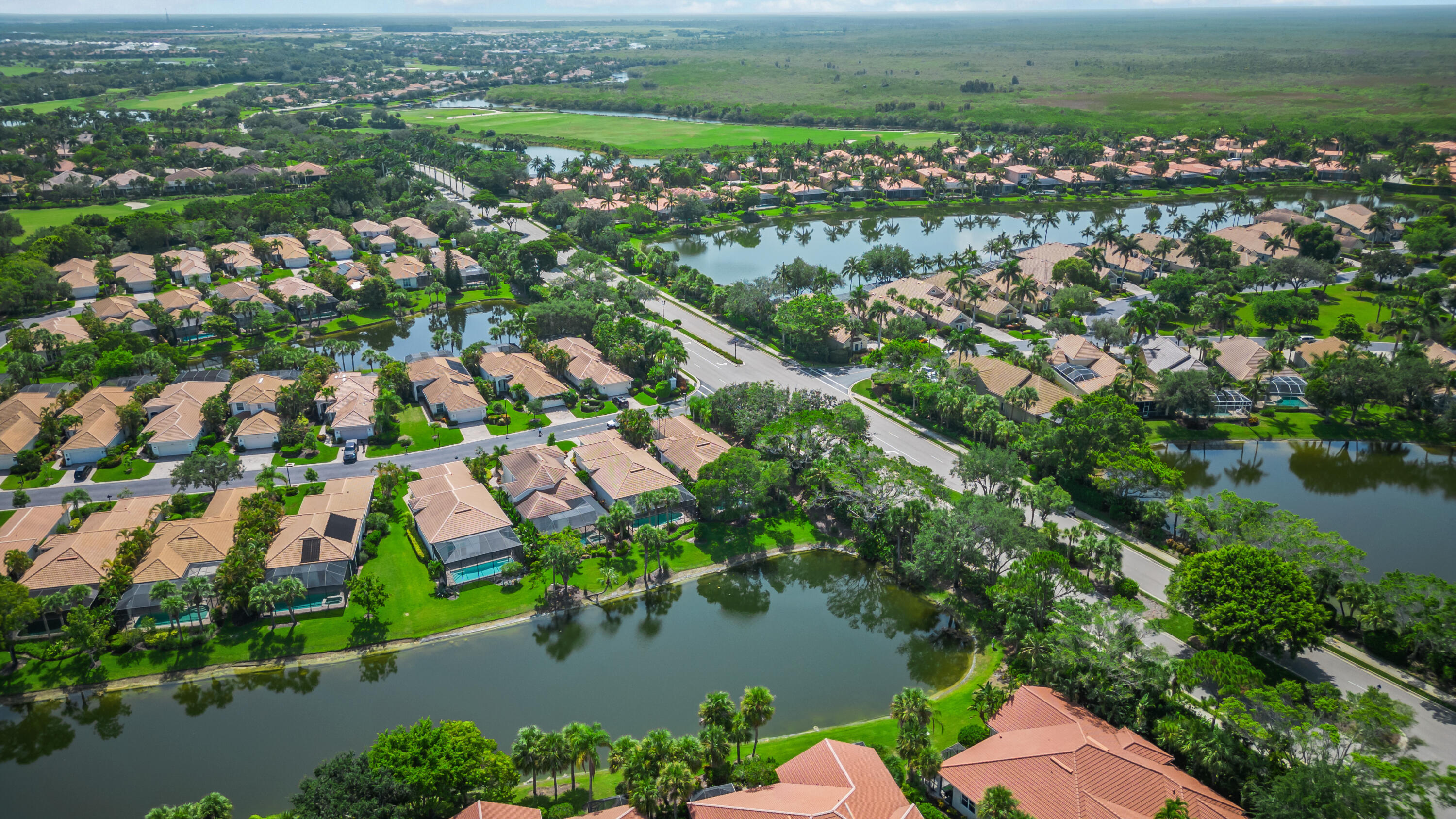 8525 Peppertree Way Naples, FL 34114 - Photo 31 of 47 an aerial view of residential houses with outdoor space and river