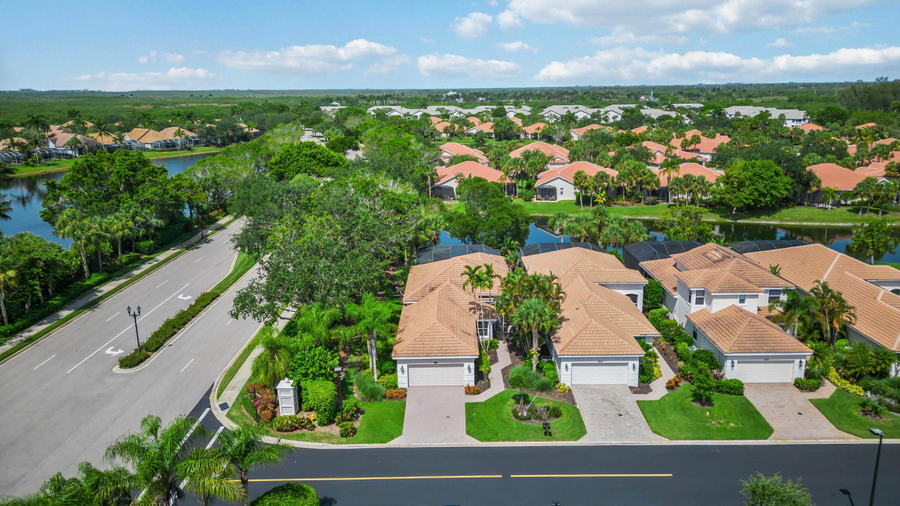 8525 Peppertree Way Naples, FL 34114 - Photo 33 of 47 an aerial view of residential houses with outdoor space and trees