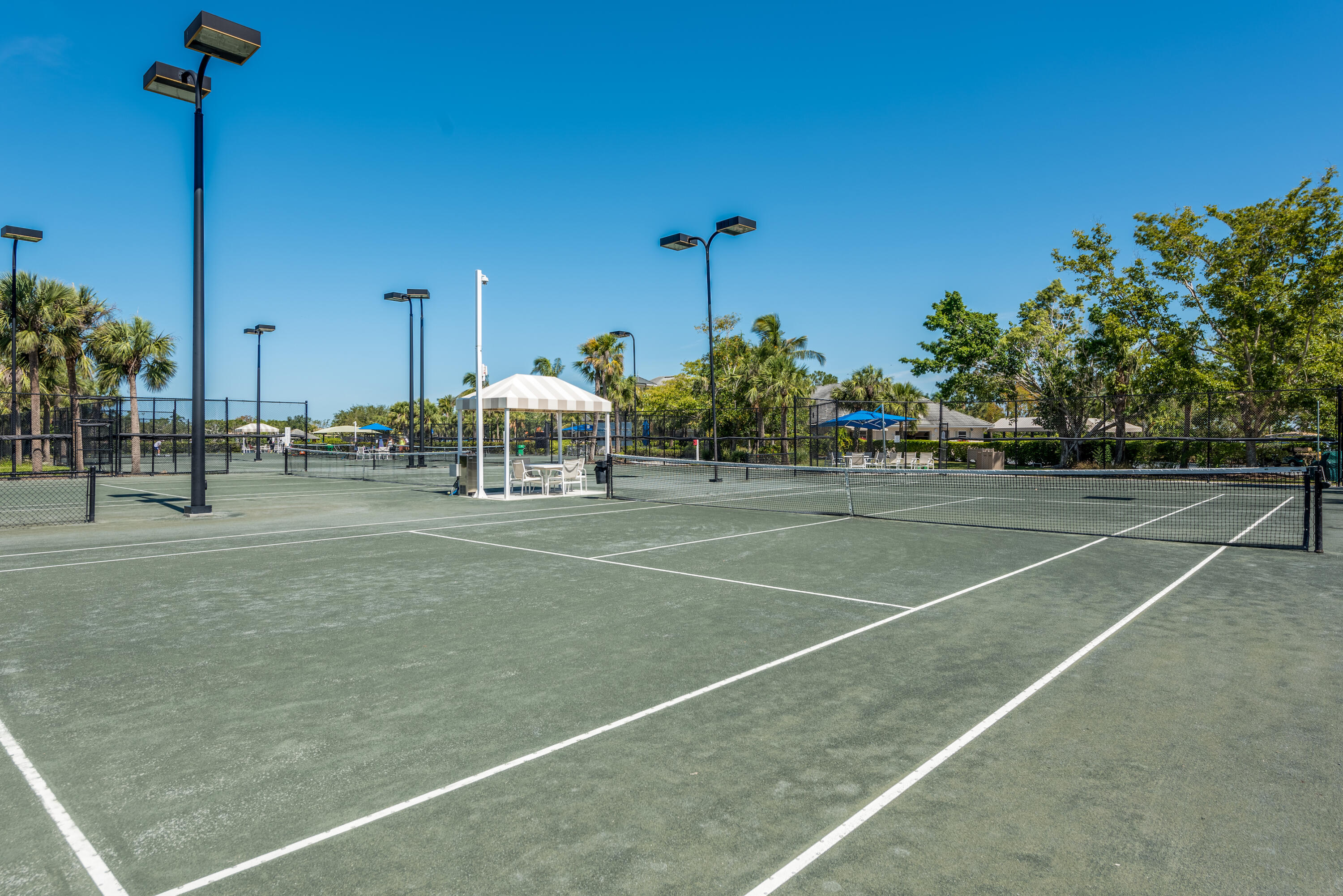 8525 Peppertree Way Naples, FL 34114 - Photo 45 of 47 a view of a tennis court