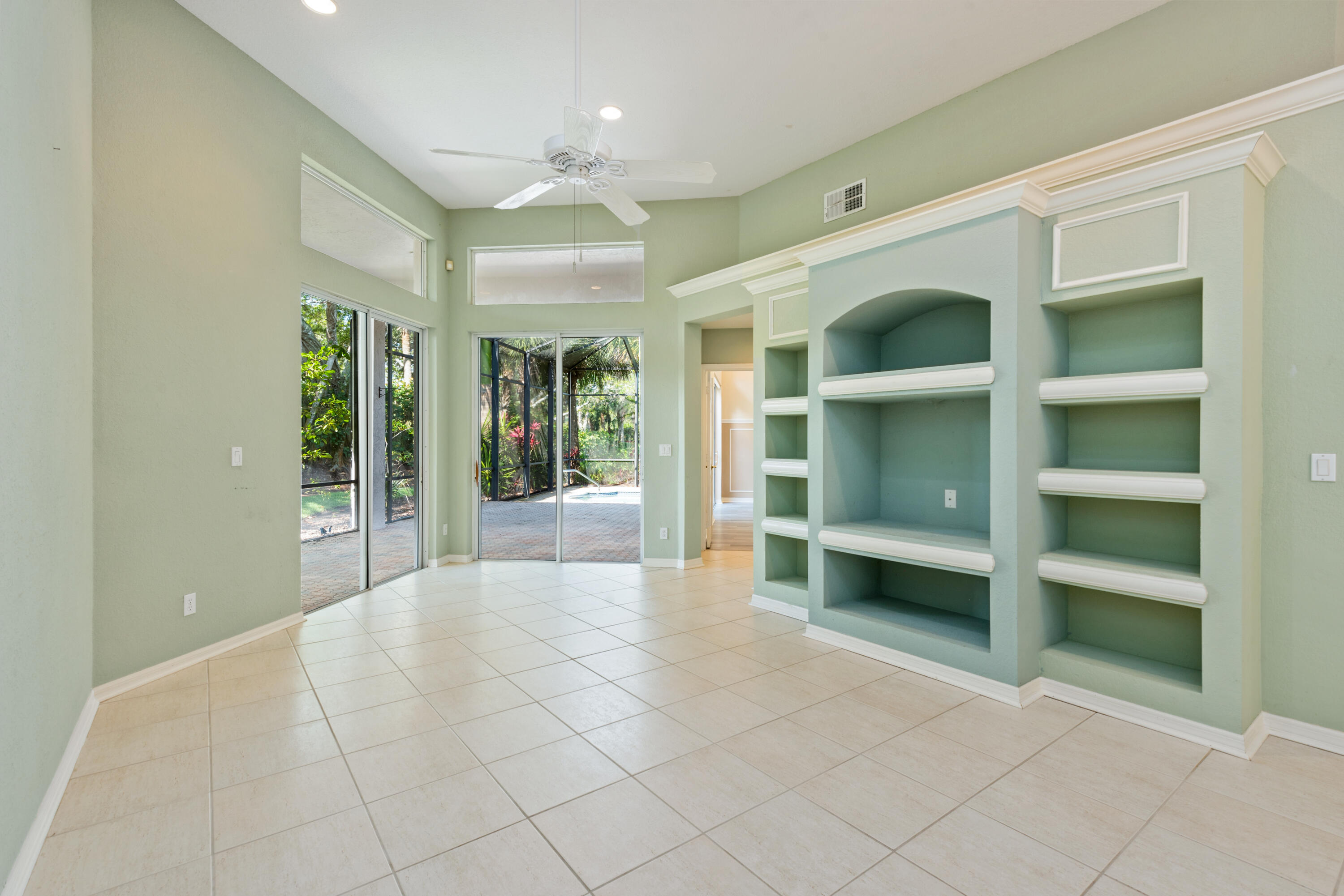 8525 Peppertree Way Naples, FL 34114 - Photo 5 of 47 a view of an entryway with wooden door
