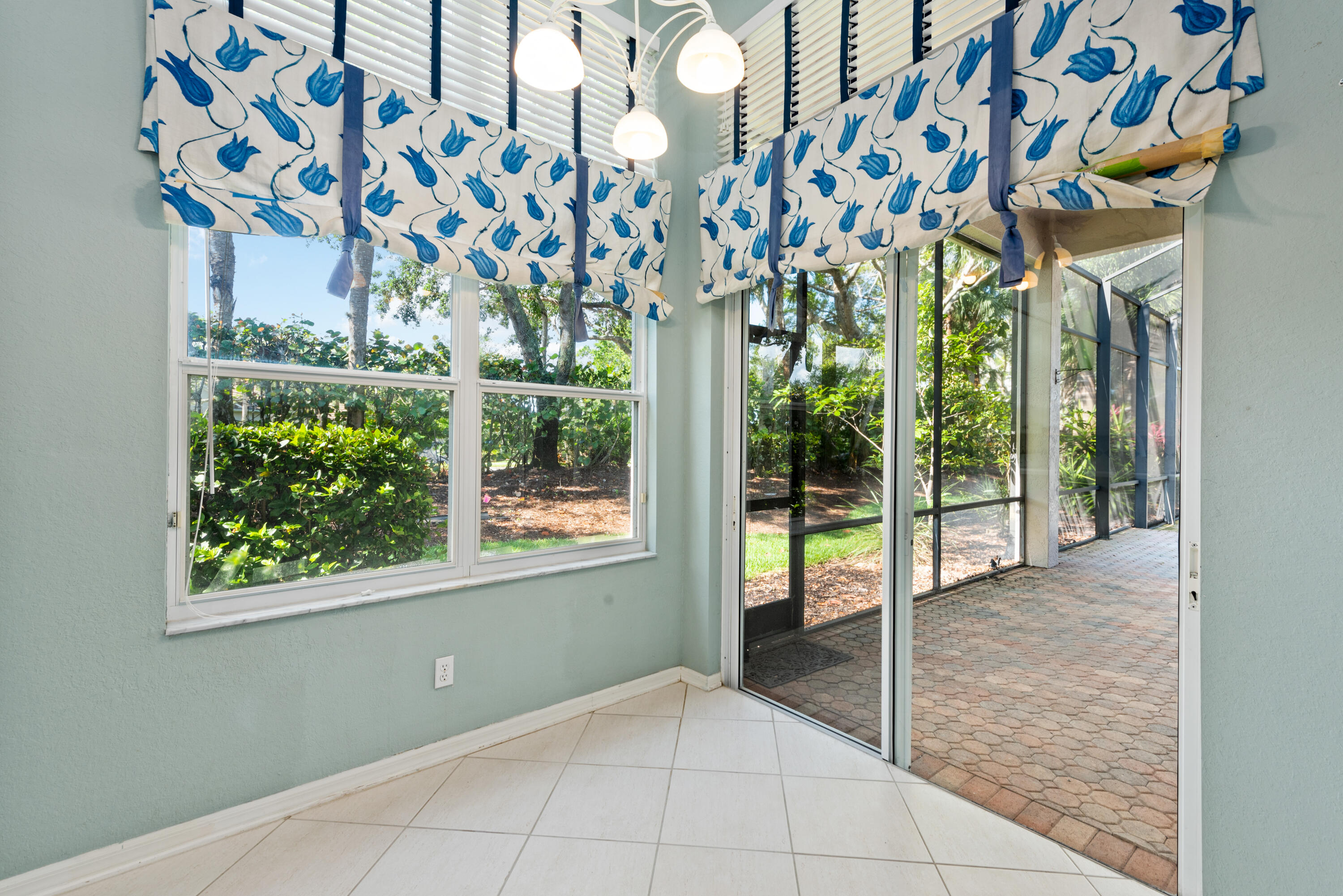 8525 Peppertree Way Naples, FL 34114 - Photo 8 of 47 a view of an entryway with garden view