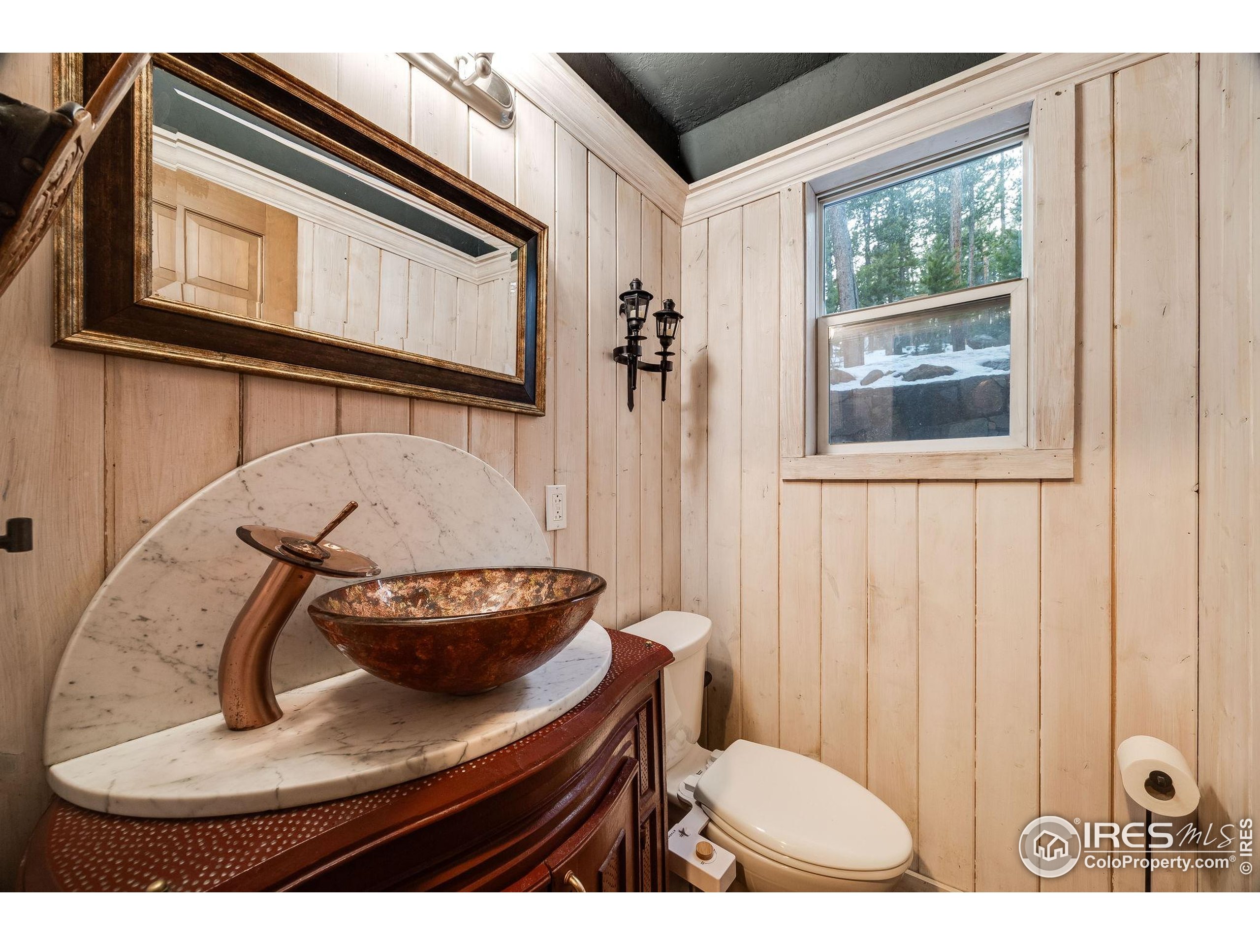 46 Apache Road Evergreen, CO 80439 - Photo 12 of 39 a view of a living room and a window