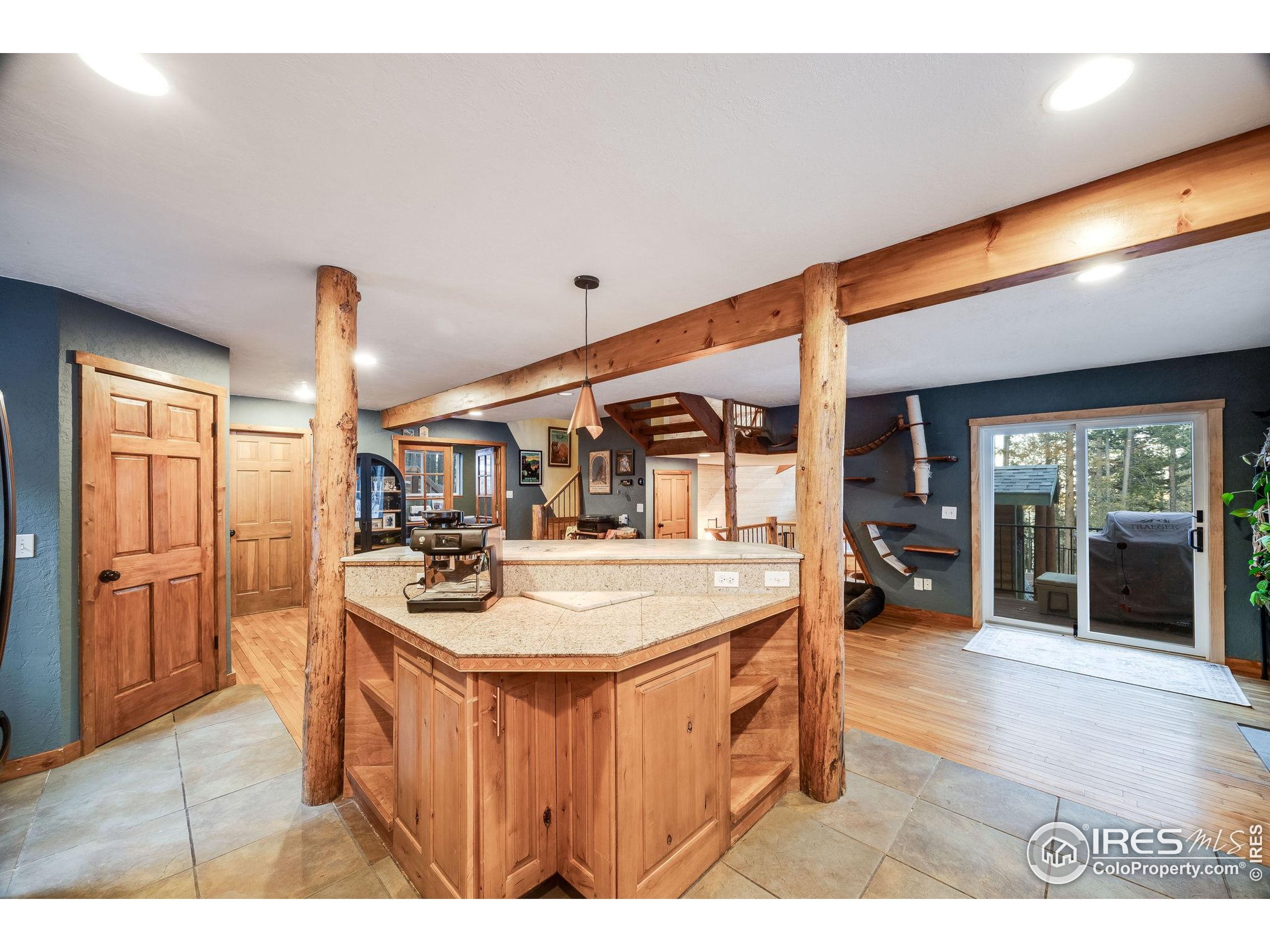 46 Apache Road Evergreen, CO 80439 - Photo 16 of 39 a kitchen with sink and refrigerator
