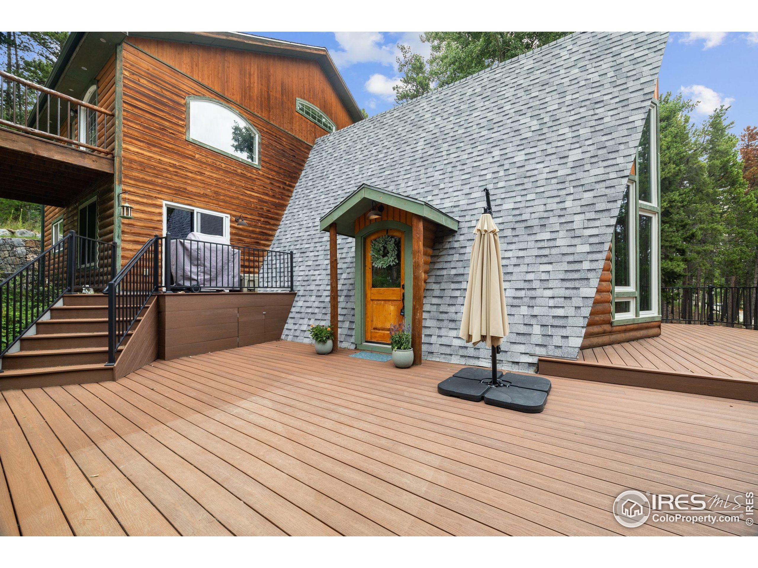 46 Apache Road Evergreen, CO 80439 - Photo 4 of 39 a view of outdoor space and deck area