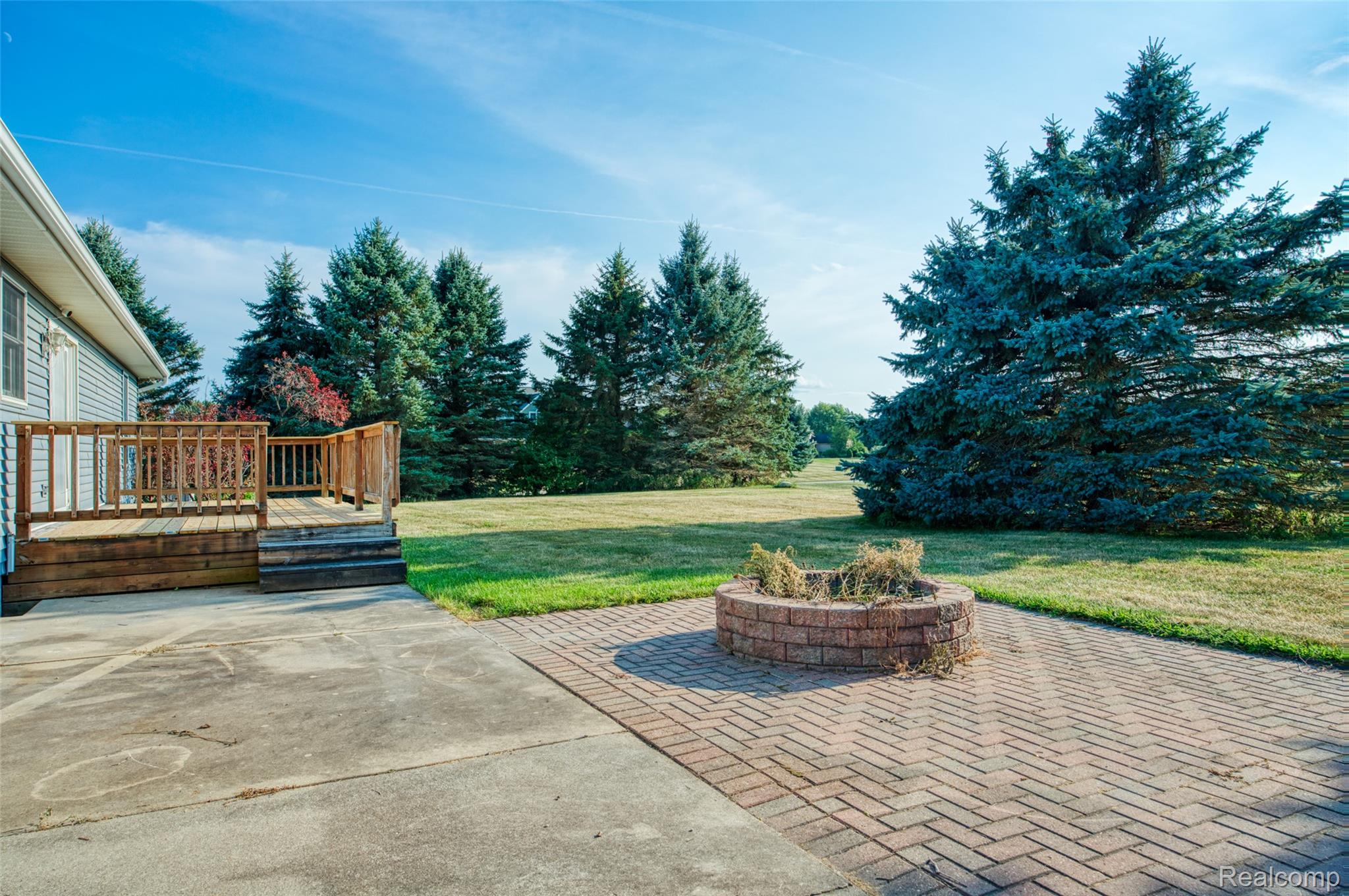 1188 South Maxfield Road Brighton, MI 48114 - Photo 22 of 24 Deck, paver patio and concrete patio