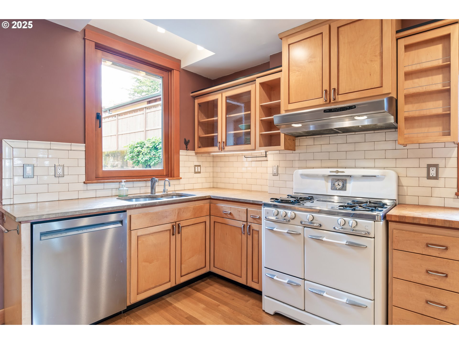 2775 Elinor Street Eugene, OR 97403 - Photo 12 of 48 a kitchen with stainless steel appliances granite countertop a stove a sink and a microwave