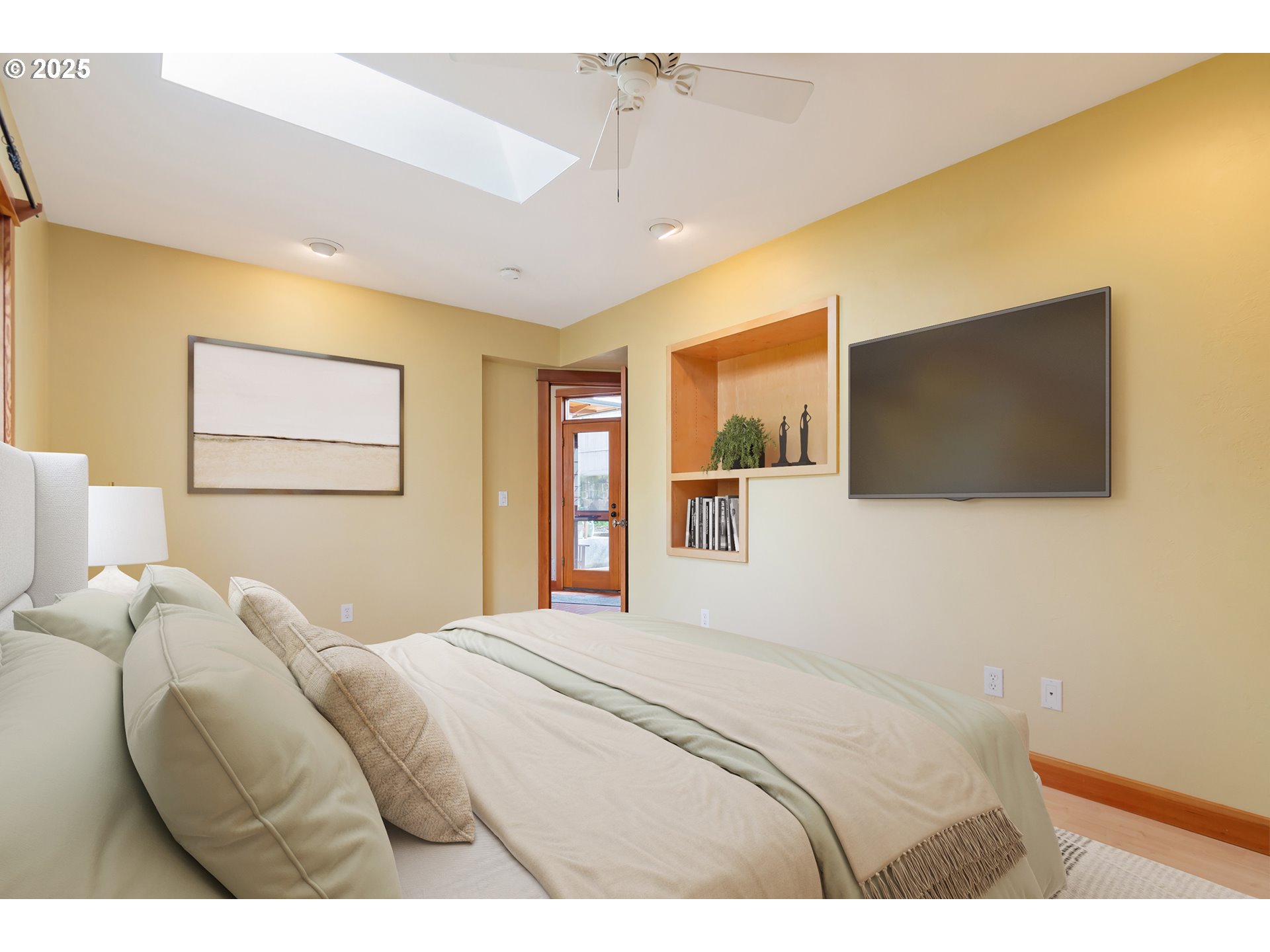 2775 Elinor Street Eugene, OR 97403 - Photo 18 of 48 a bedroom with a bed and a flat screen tv