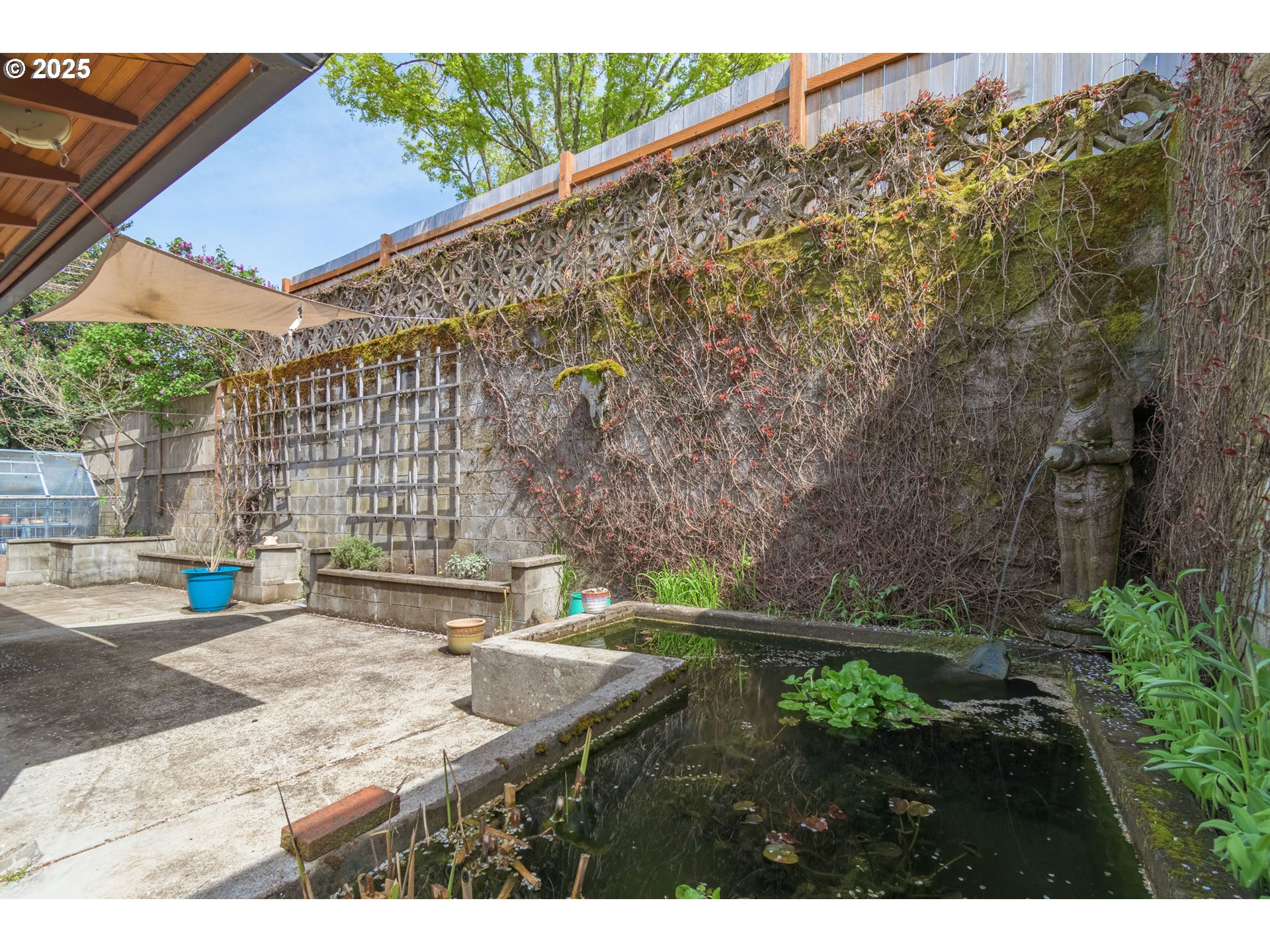 2775 Elinor Street Eugene, OR 97403 - Photo 38 of 48 a backyard of a house with a yard and outdoor seating