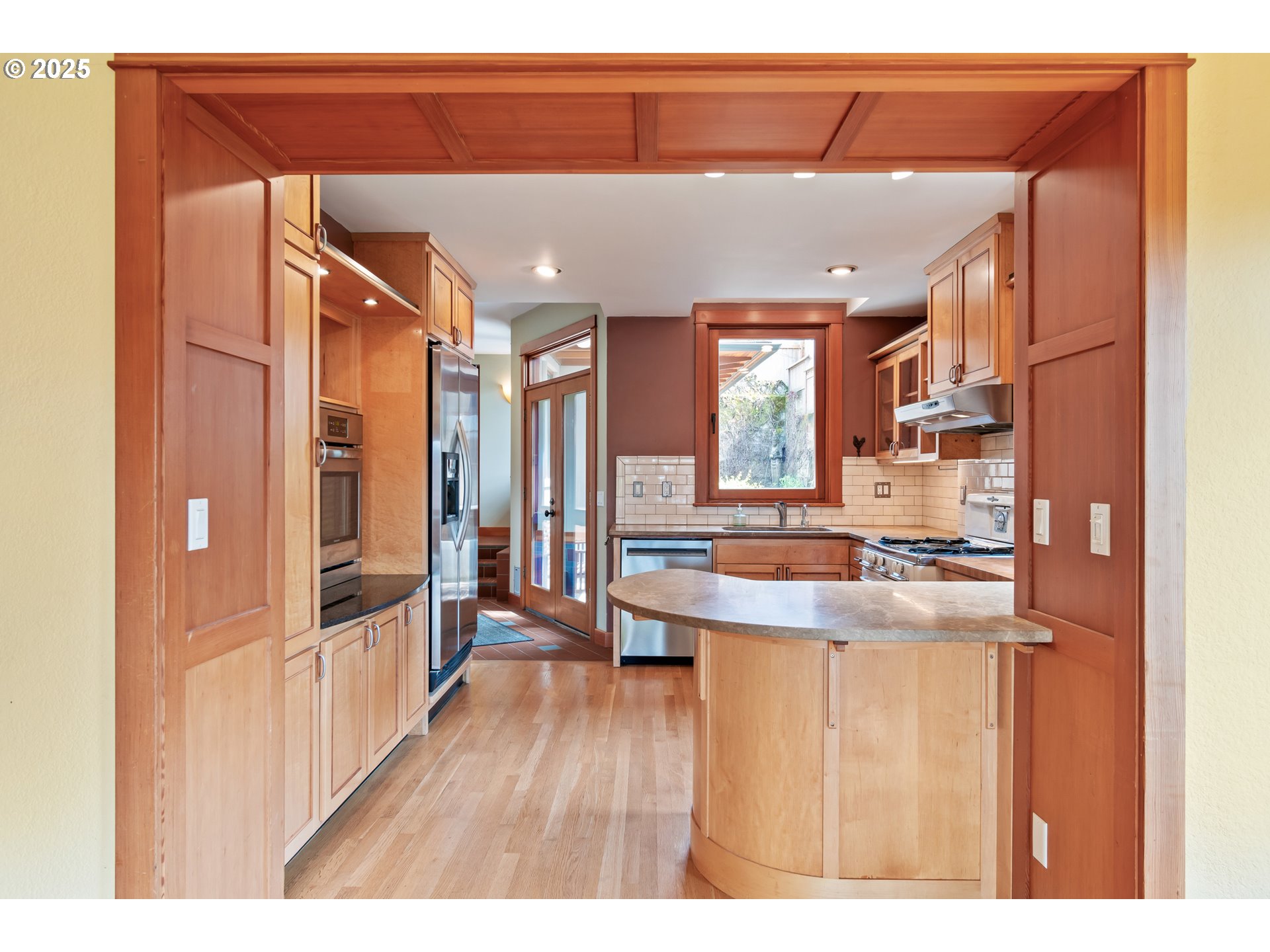 2775 Elinor Street Eugene, OR 97403 - Photo 10 of 48 a kitchen view with wooden floor and cabinets