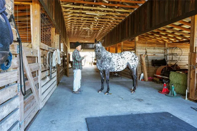 a room with furniture and flat screen tv