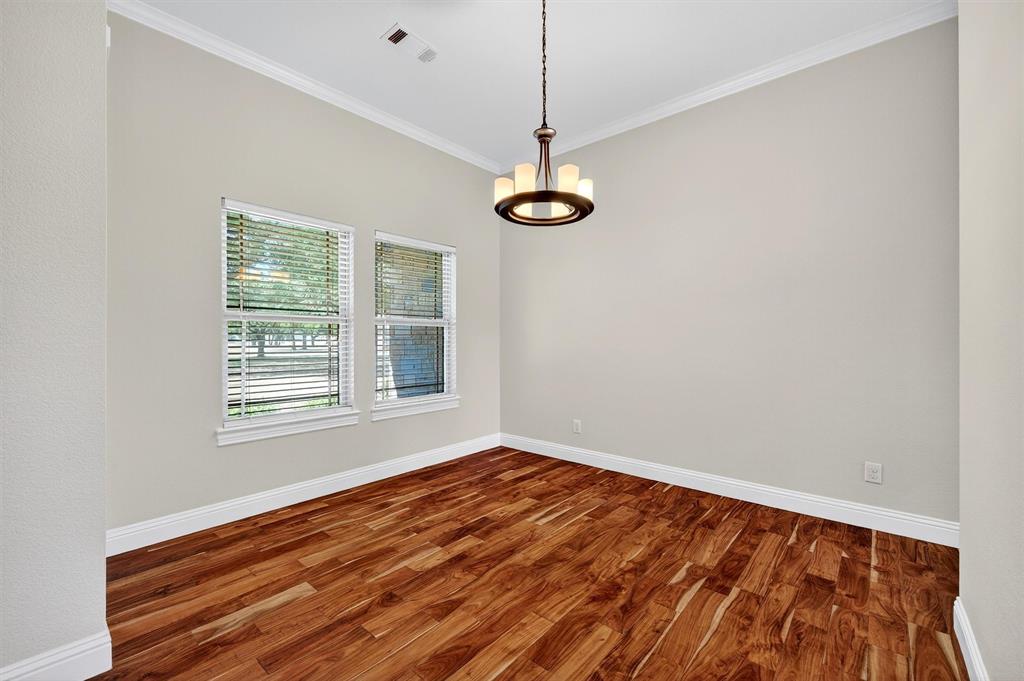 357 Pear Tree Lane Collinsville, TX 76233 - Photo 13 of 37 a view of empty room with wooden floor