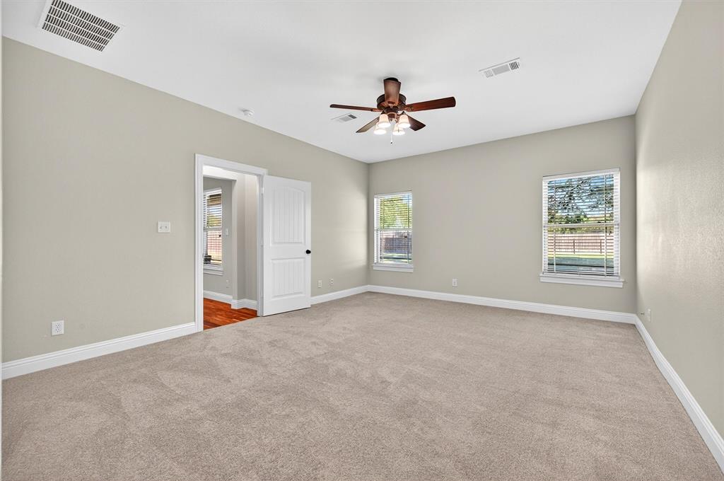 357 Pear Tree Lane Collinsville, TX 76233 - Photo 19 of 37 a view of an empty room with a window