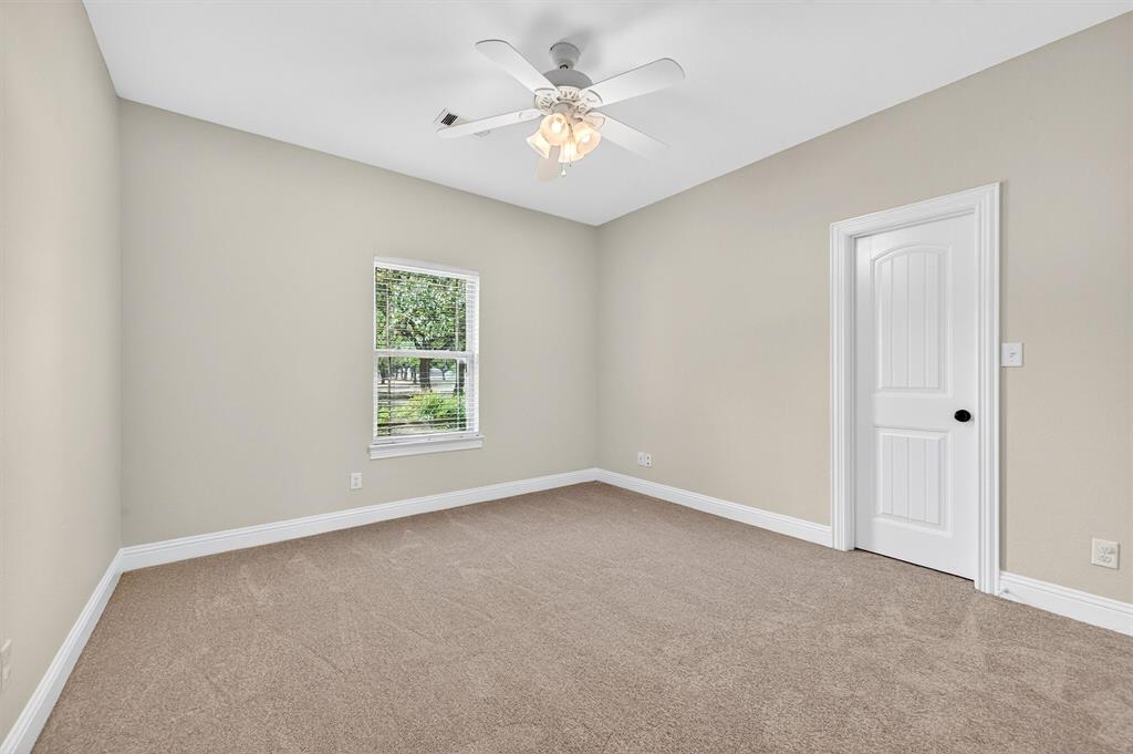 357 Pear Tree Lane Collinsville, TX 76233 - Photo 25 of 37 a view of room with window and ceiling fan