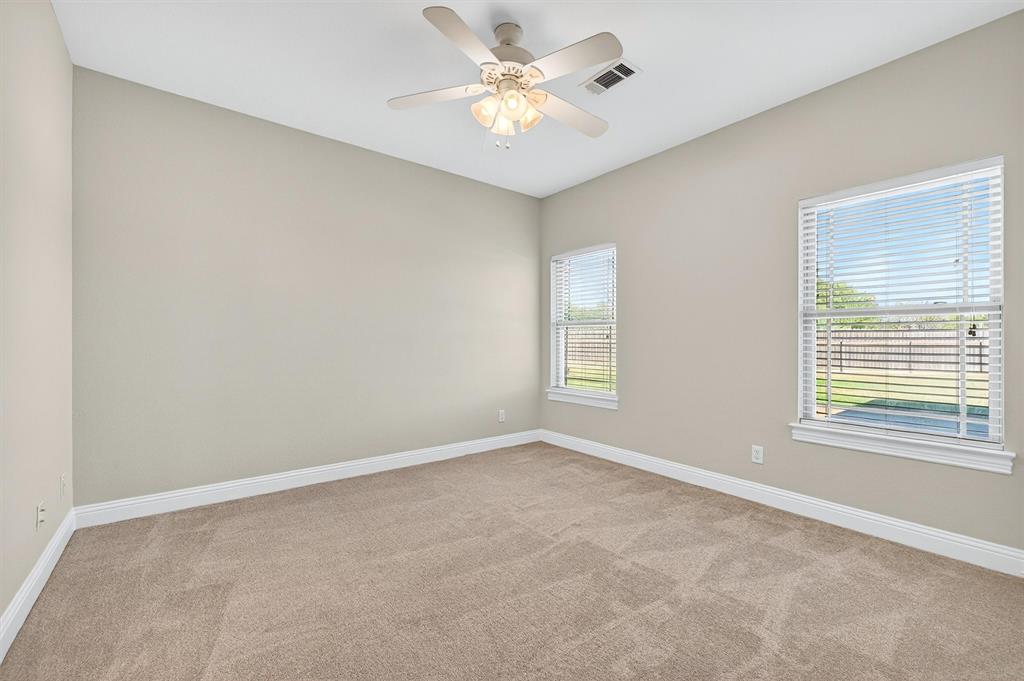 357 Pear Tree Lane Collinsville, TX 76233 - Photo 29 of 37 a view of an empty room with a window
