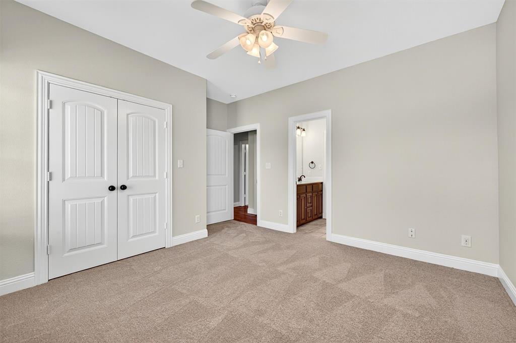 357 Pear Tree Lane Collinsville, TX 76233 - Photo 30 of 37 a view of a livingroom with a chandelier fan