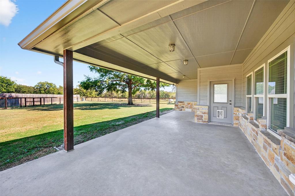 357 Pear Tree Lane Collinsville, TX 76233 - Photo 32 of 37 a view of a house with a big yard