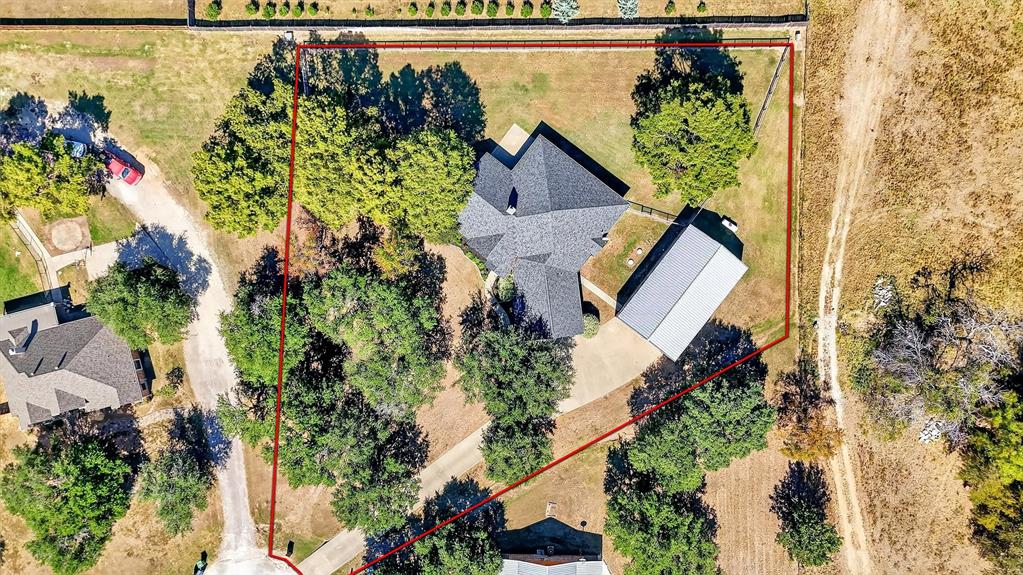 357 Pear Tree Lane Collinsville, TX 76233 - Photo 6 of 37 an aerial view of a house with a yard