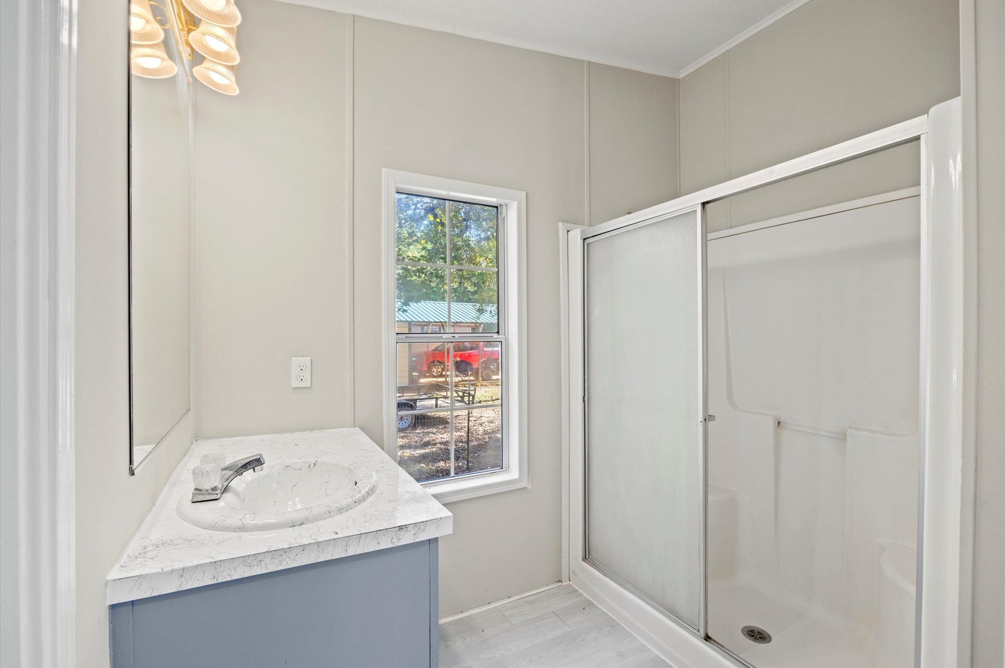 2701 Farm To Market 1127 Shepherd, TX 77371 - Photo 16 of 30 a bathroom with a sink and a mirror