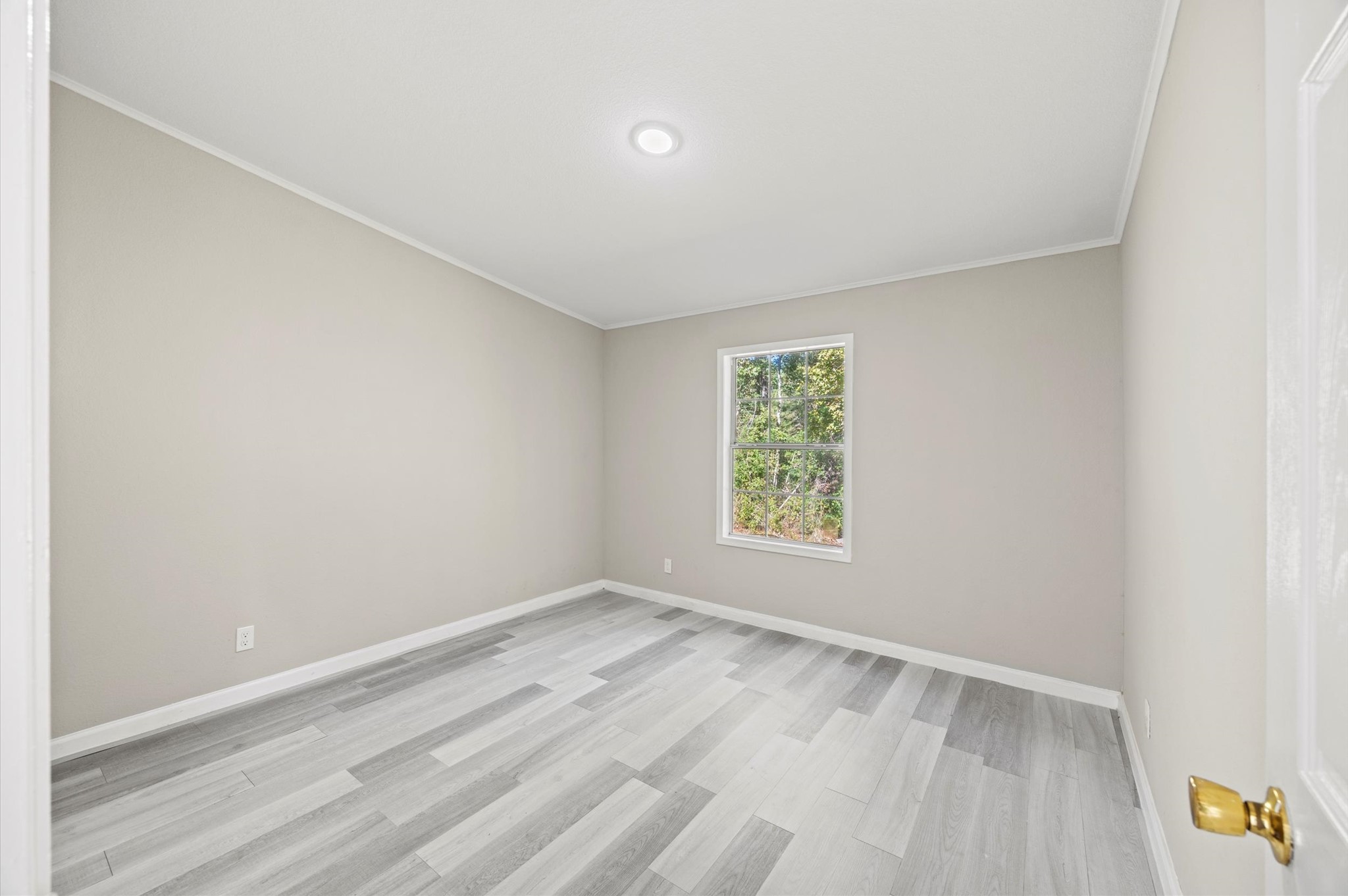 2701 Farm To Market 1127 Shepherd, TX 77371 - Photo 19 of 30 an empty room with a window