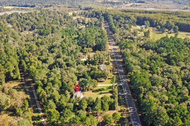a view of a lake with a building in the background