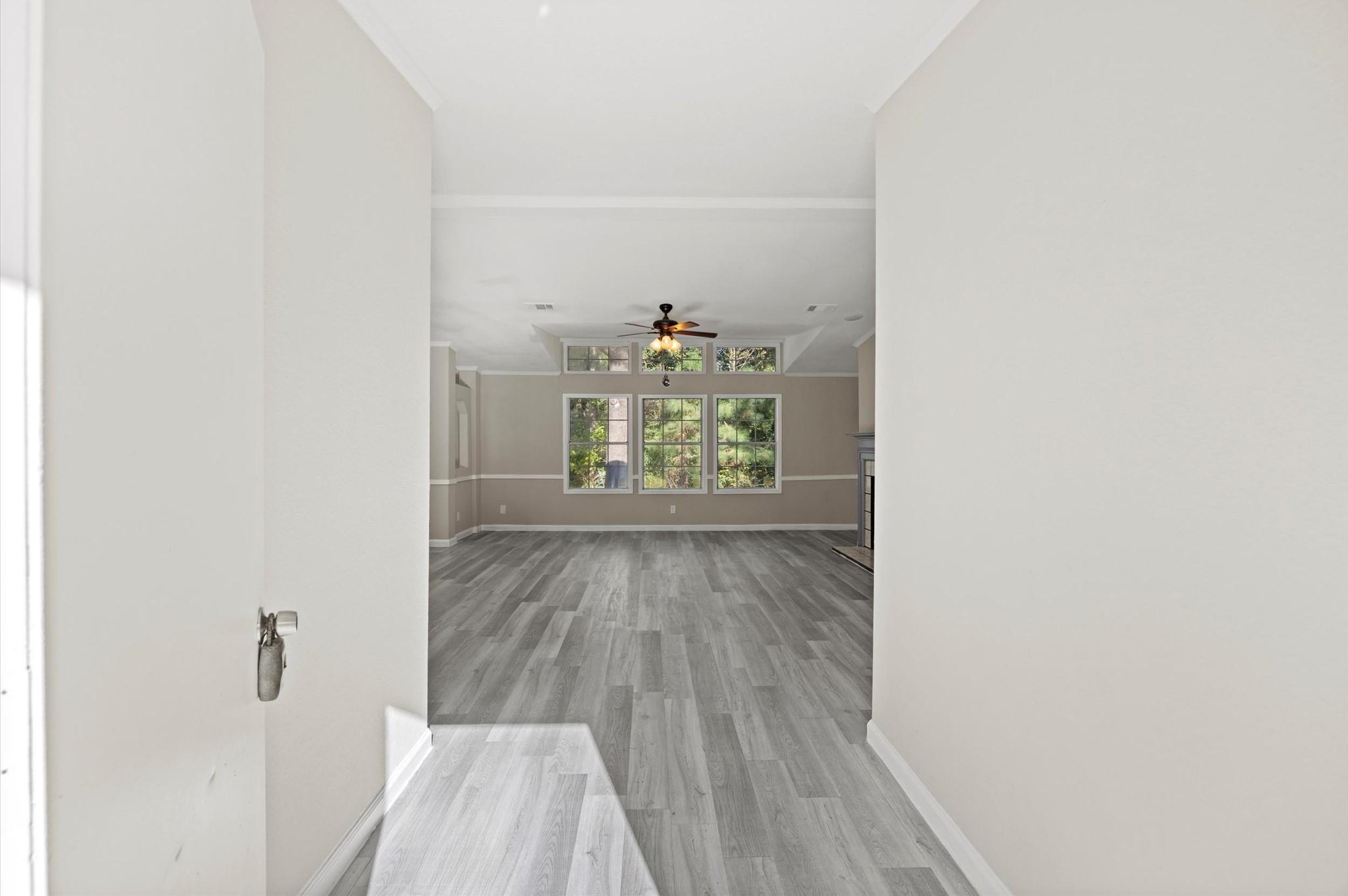 2701 Farm To Market 1127 Shepherd, TX 77371 - Photo 3 of 30 a view of a hallway with wooden floor