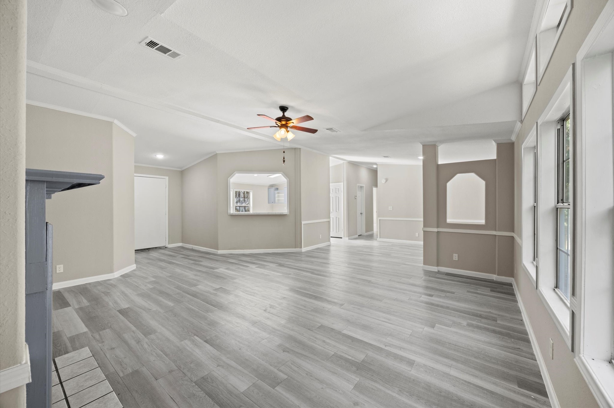 2701 Farm To Market 1127 Shepherd, TX 77371 - Photo 6 of 30 a view of a room with wooden floor and window