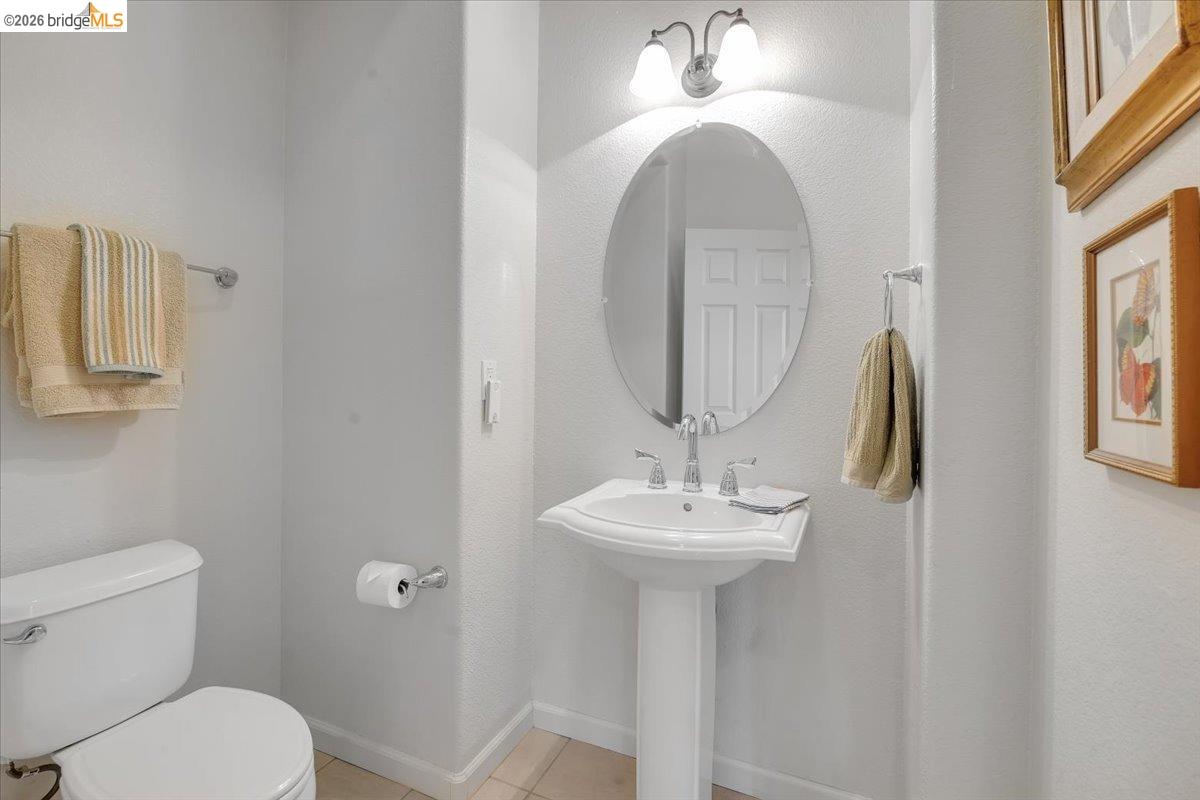 258 Rock Ridge Lane Copperopolis, CA 95228 - Photo 38 of 47 Bathroom with toilet and light tile patterned flooring