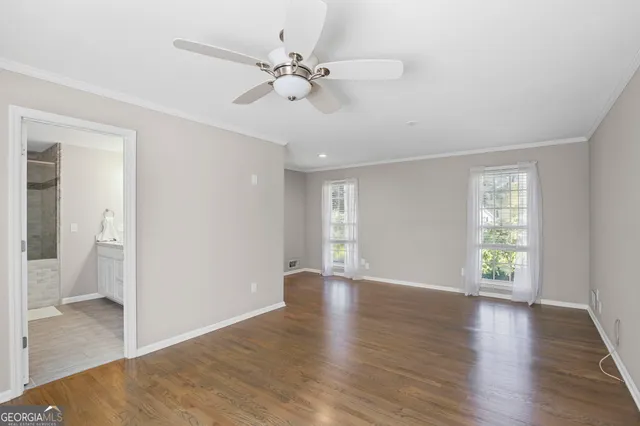 a bathroom with a shower and a toilet