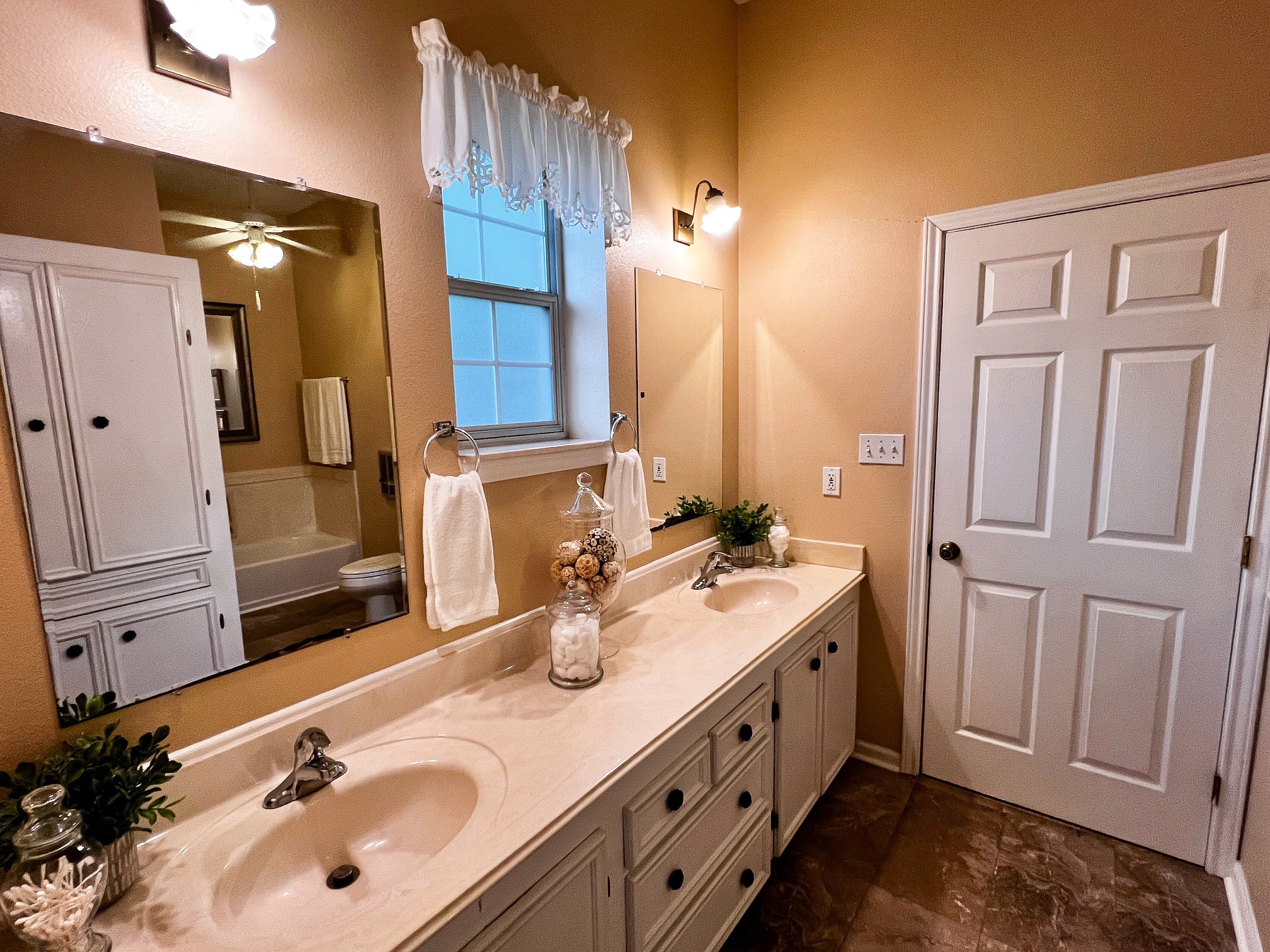 730 Panorama Road La Grange, TX 78945 - Photo 18 of 37 a bathroom with double vanity sink and a mirror