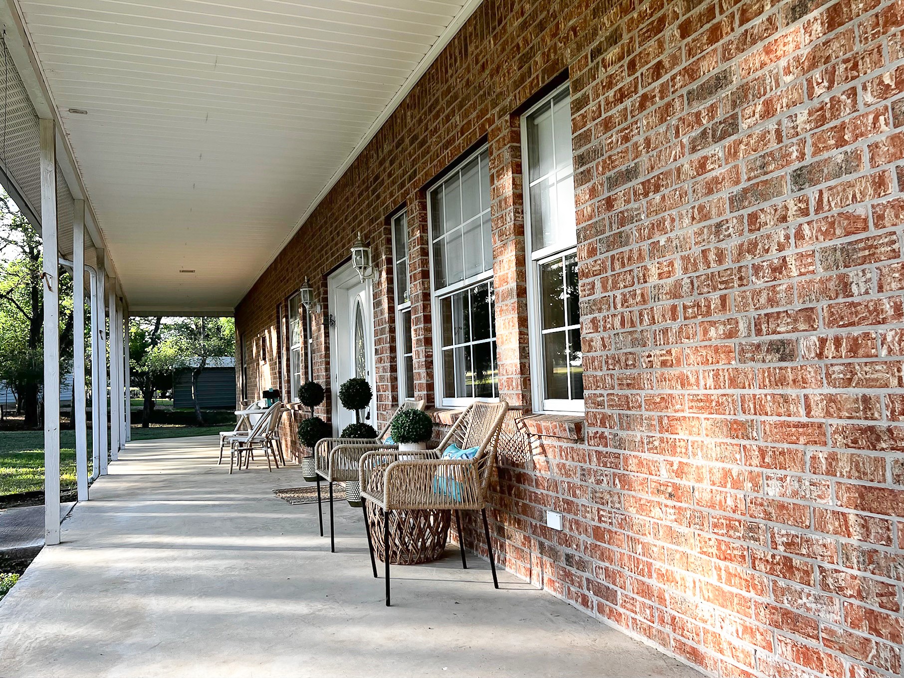 730 Panorama Road La Grange, TX 78945 - Photo 26 of 37 a building outdoor space with patio furniture and potted plants